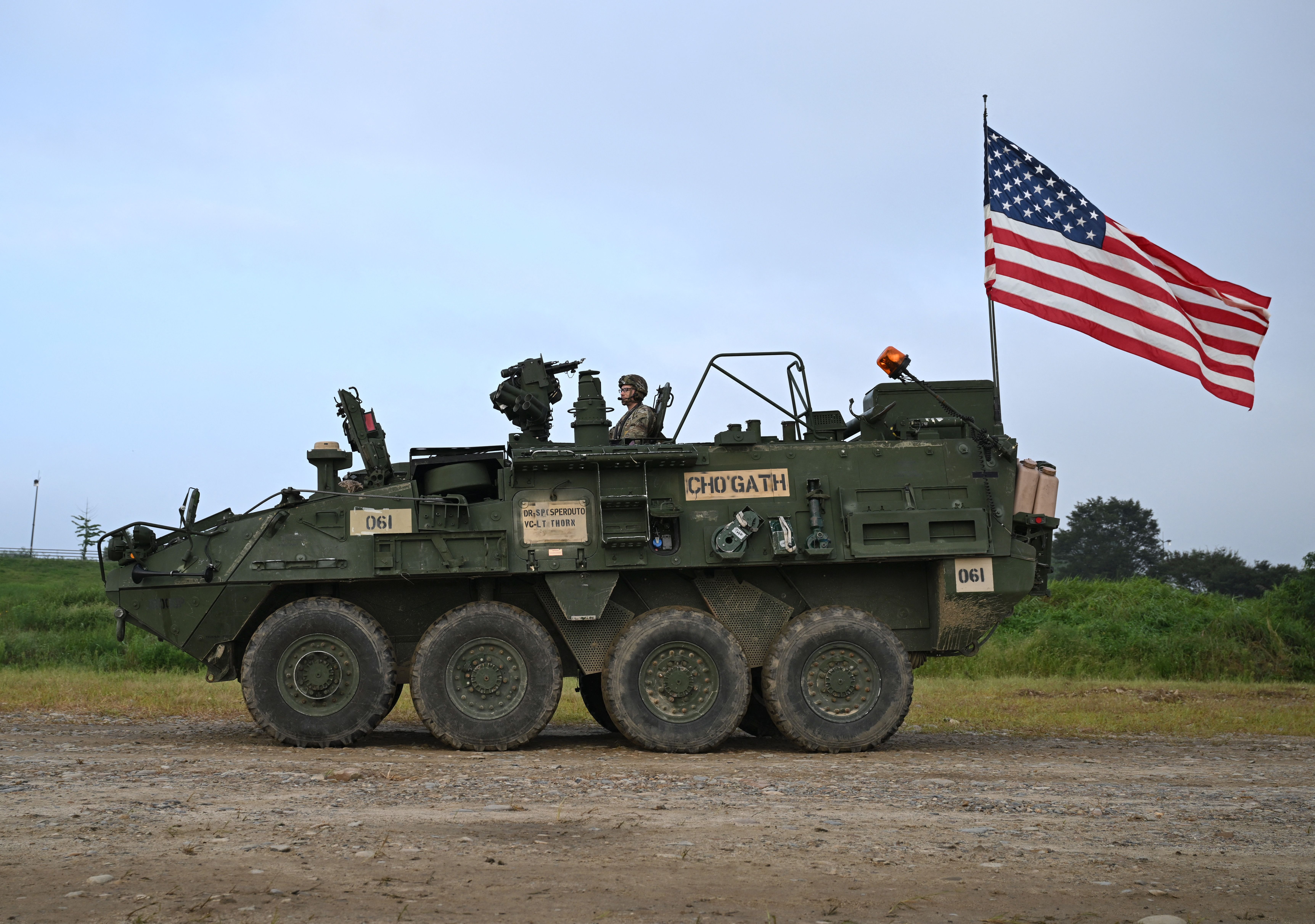 A US Stryker infantry carrier vehicle moves to cross a river over a floating bridge during a South Korea-US joint river-crossing drill as part of the annual Ulchi Freedom Shield military exercise in Yeoju on August 27, 2025.