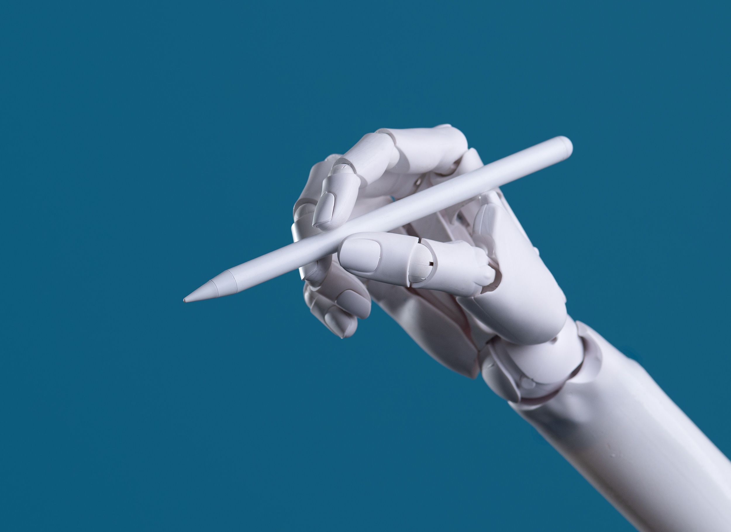 Robot Hand Holding a Digital Stylus: AI Art, Design, and Precision Technology Concept