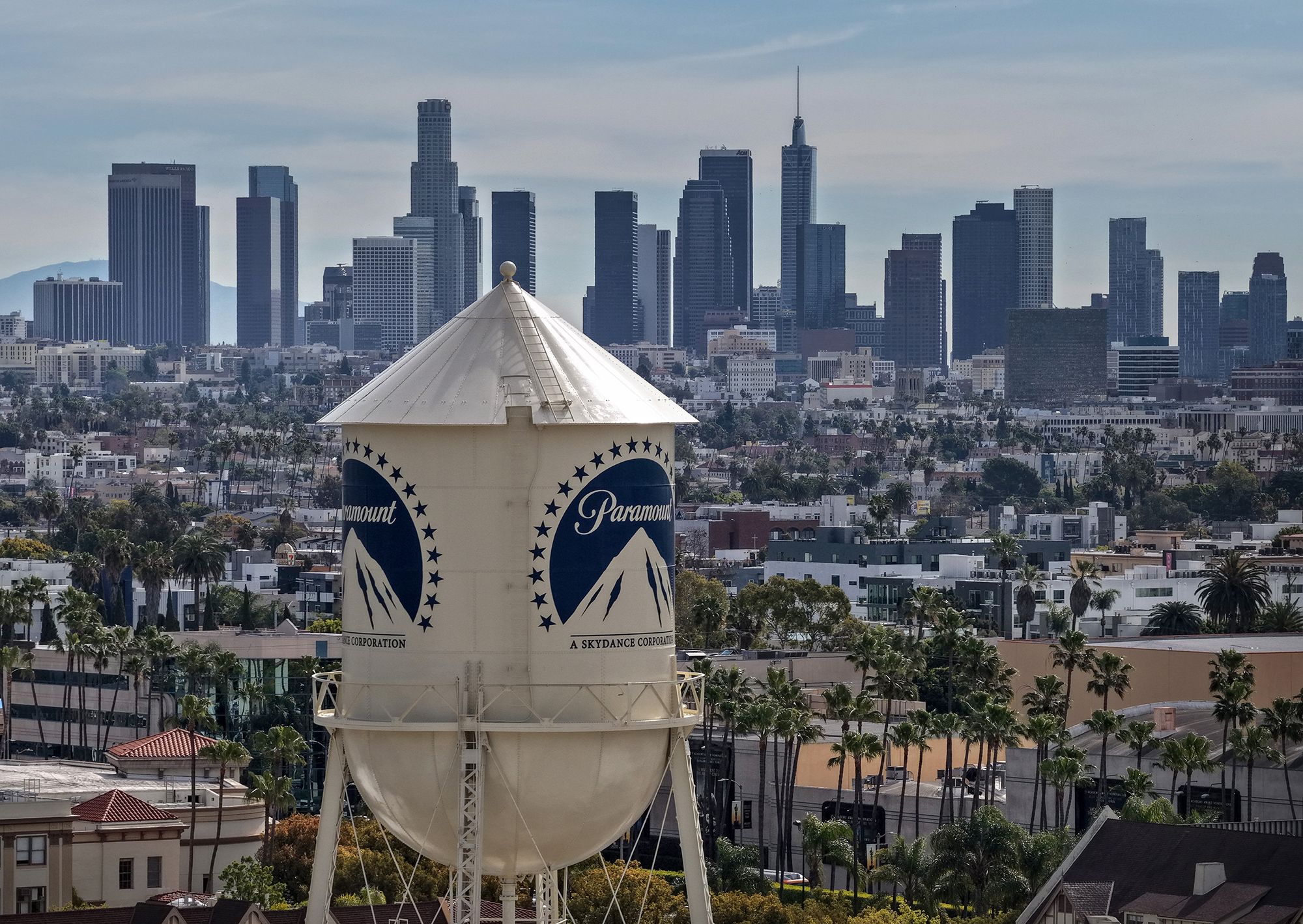 LOS ANGELES, CALIFORNIA - FEBRUARY 23: An aerial view of the Paramount logo on the water tower at Paramount Studios on February 23, 2026 in Los Angeles, California. Paramount Skydance is poised to increase its takeover offer for Warner Bros. Discovery above Netflix’s current bid, setting up a high-stakes bidding war that could see Netflix walk away from the deal if outbid. (Photo by Justin Sullivan/Getty Images)