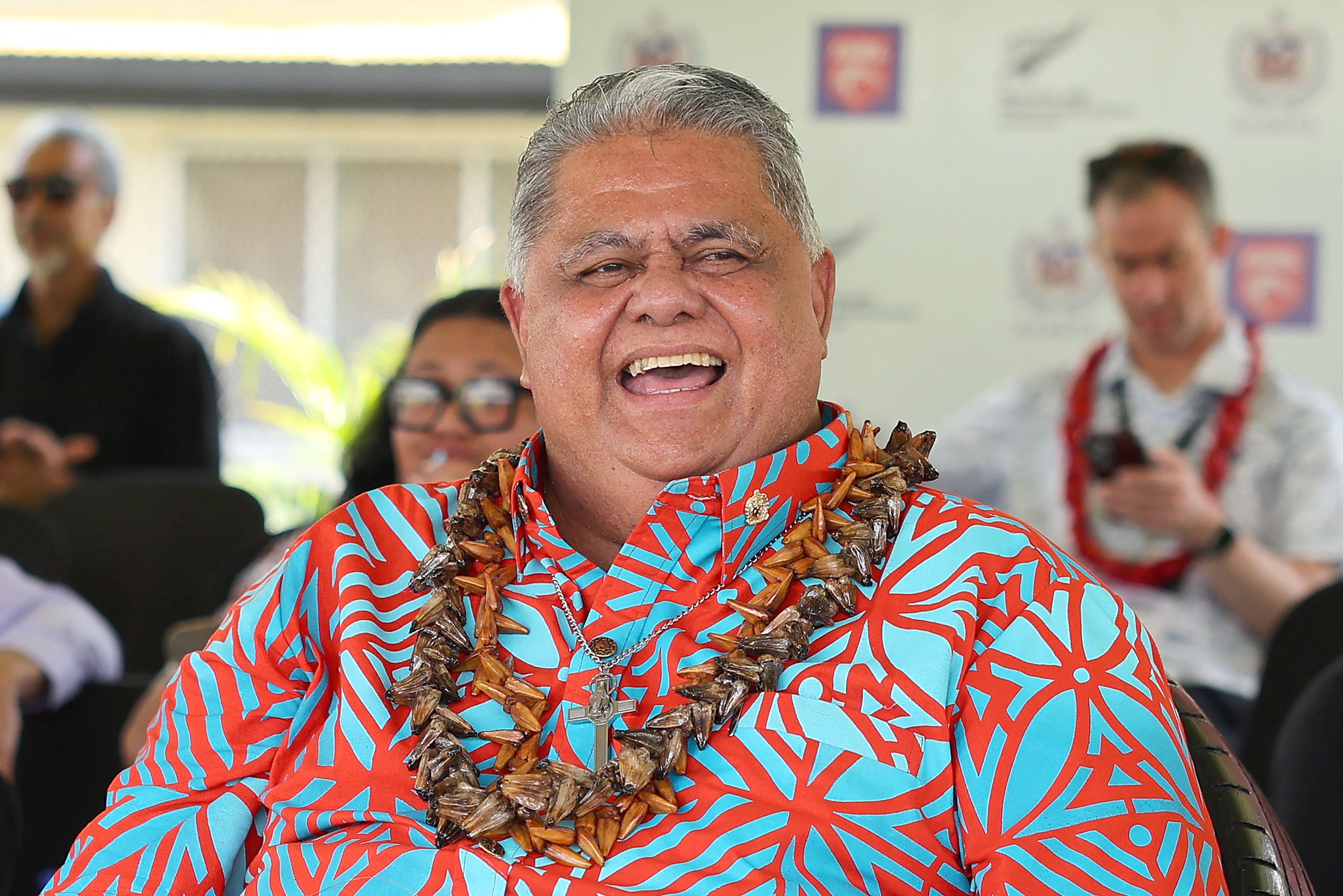 Samoan Prime Minister Laaulialemalietoa Leuatea Schmidt watches a rugby match between Auckland's Tipene College and Samoa's Wesley College with his New Zealand counterpart Christopher Luxon in the village of Faleula, Samoa, on March 17, 2026.