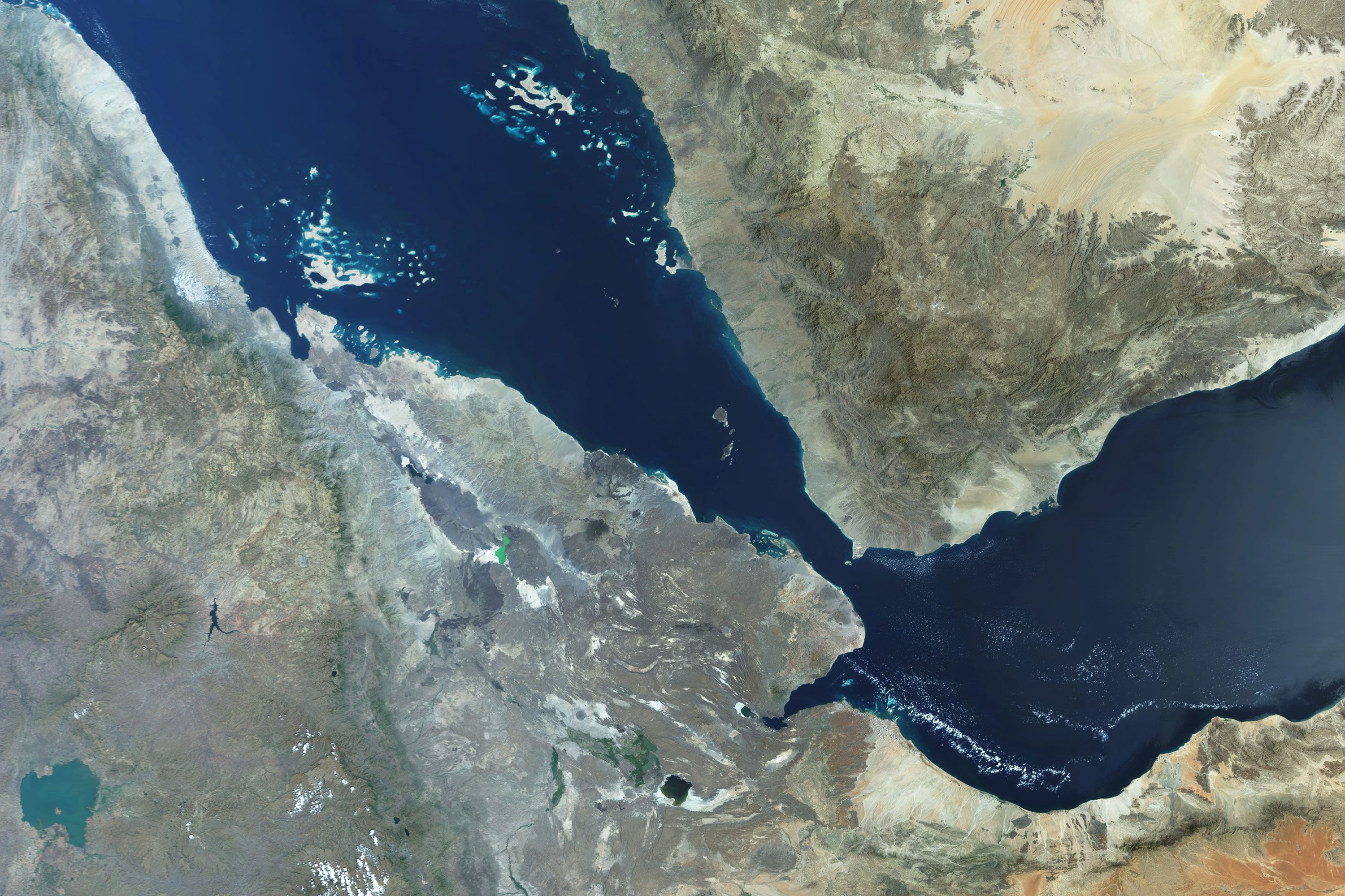 A satellite view of the Bab al-Mandeb Strait in the Red Sea, a vital trade route and hotspot for piracy and regional conflict.