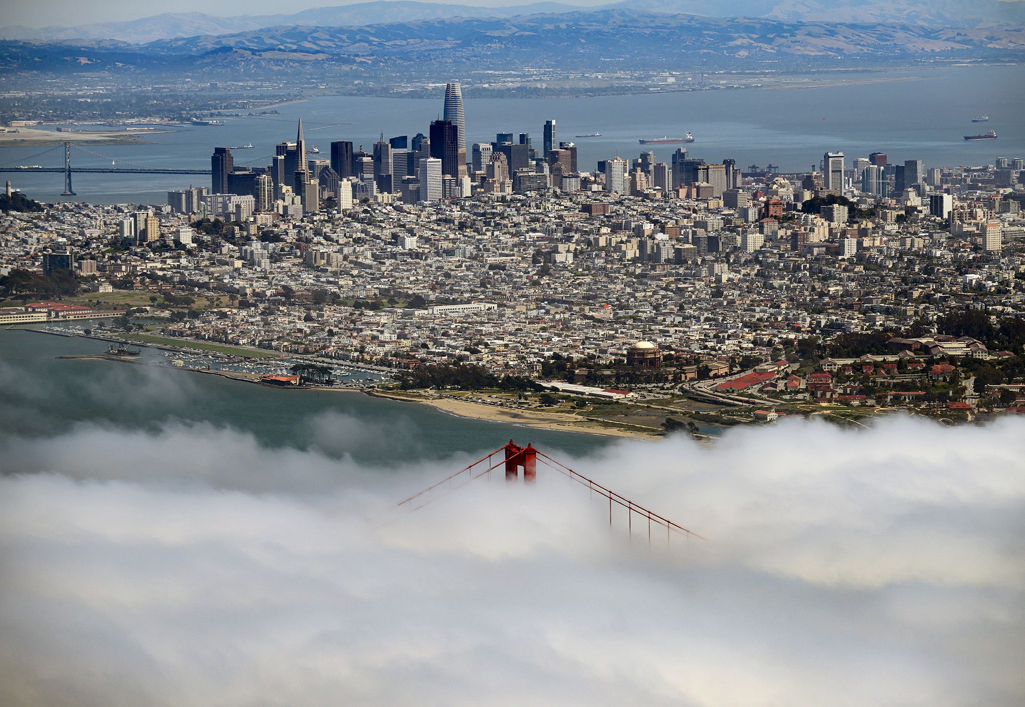 Fog rolls by the Golden Gate Bridge in San Francisco, California, on May 20, 2026.