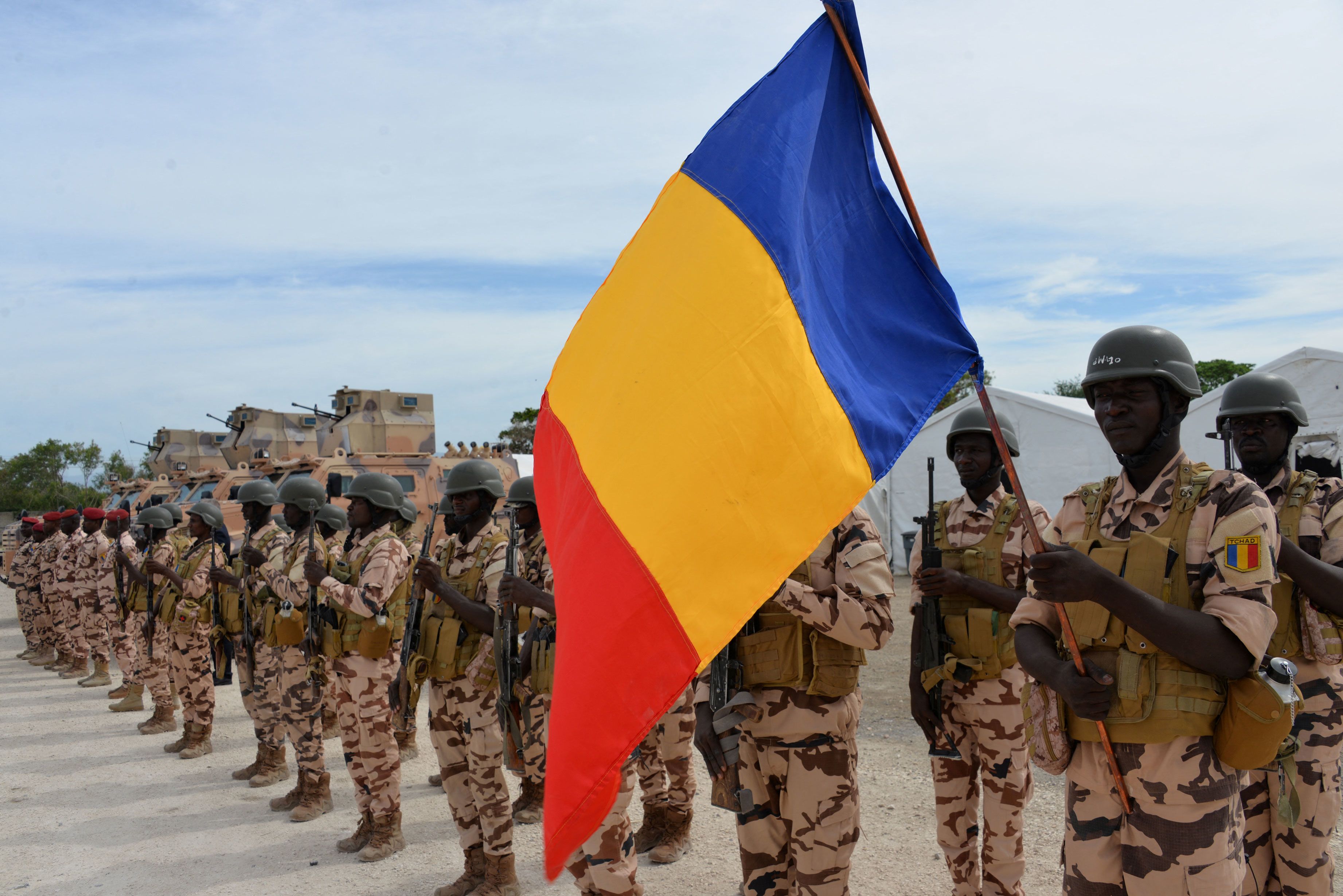 Chadian soldiers of the international Gang Suppression Force (GSF) greet UN Secretary General Antonio Guterres in Port-au-Prince on June 16, 2026.