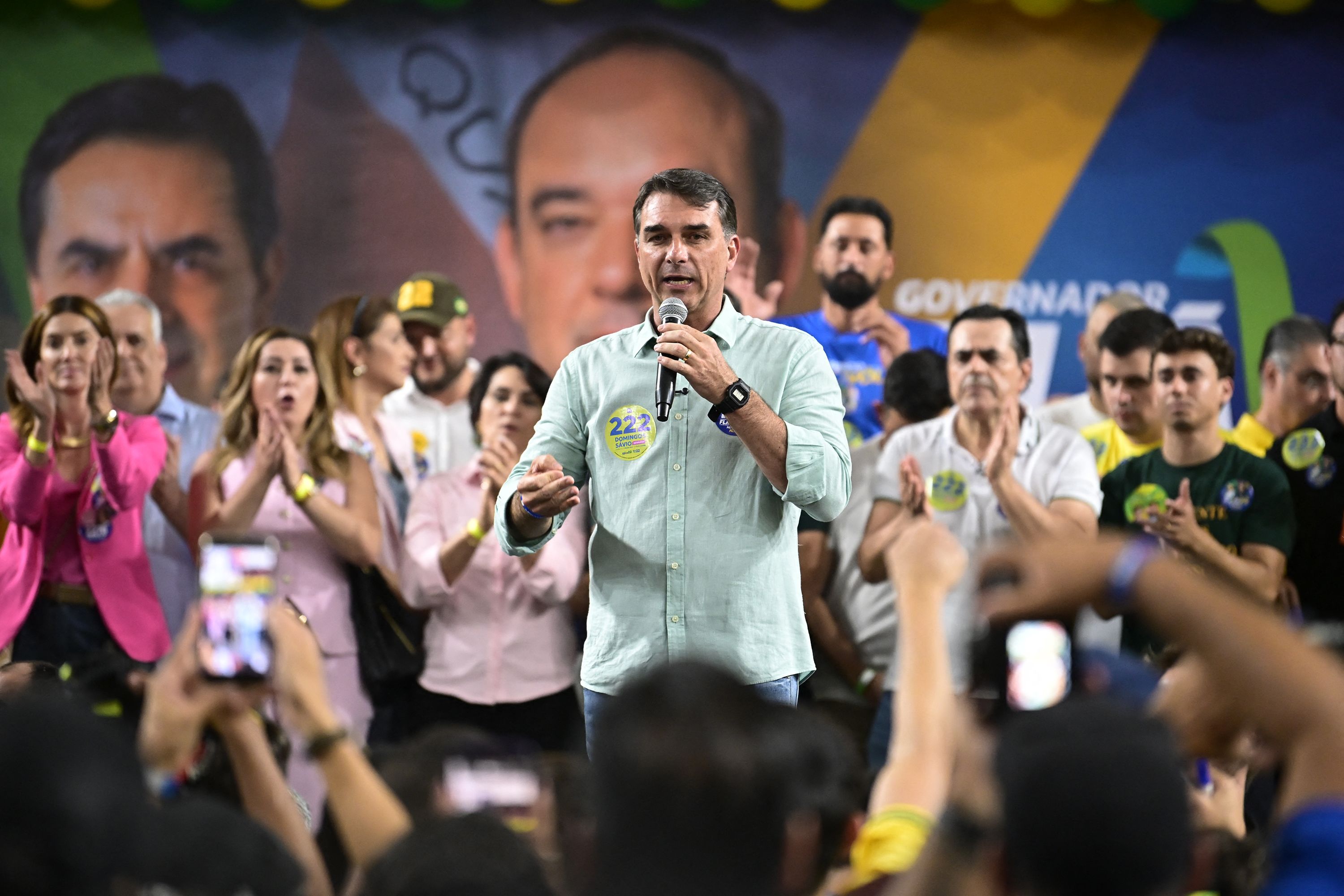 Senator and right-wing presidential candidate Flavio Bolsonaro speaks to supporters during a rally at Mackenzie Esporte Clube in Belo Horizonte, Brazil on August 17, 2026. Brazilians will go to the polls next October 4 once again deeply polarized and under the shadow of US President Donald Trump, who has backed conservative candidates in recent elections in Latin America. (Photo by Gledston Tavares / AFP via Getty Images)