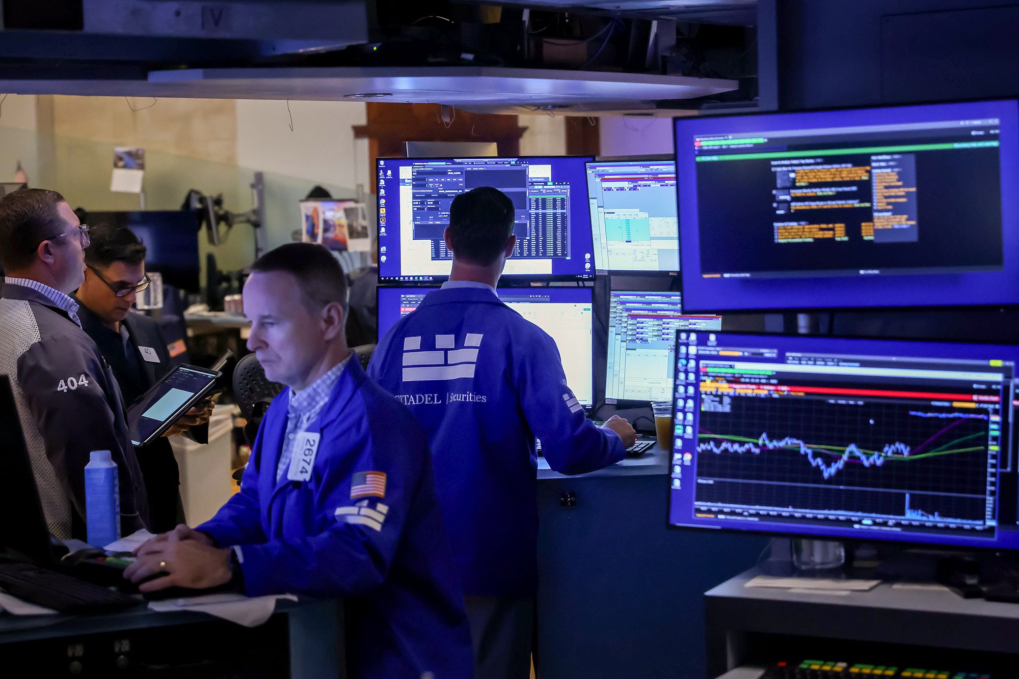 Traders work on the floor of the New York Stock Exchange (NYSE) in New York, US, on Wednesday, Aug. 19, 2026. Wall Street staged a rebound after the Treasury said it plans to boost buybacks of longer-dated bonds, a signal the US wants to lower borrowing costs after yields hit multi-decade highs.