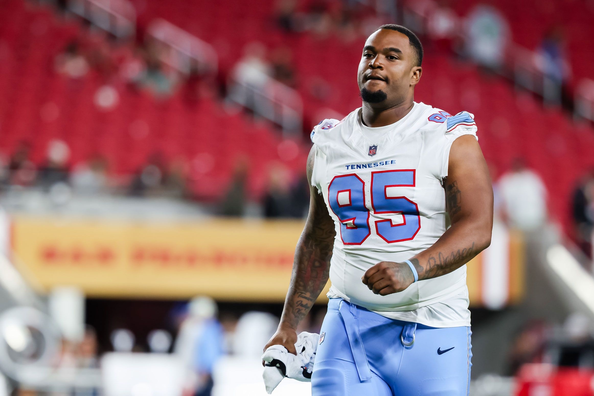 Jordan Elliott of the Tennessee Titans walks to the locker room after a preseason NFL game on August 13 at Levi's Stadium in Santa Clara, California.