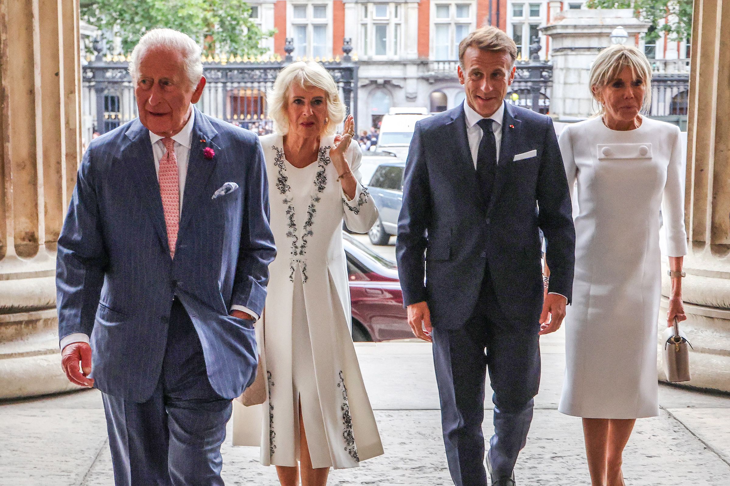 From left: Britain's King Charles III, Britain's Queen Camilla, France's President Emmanuel Macron and his wife Brigitte Macron walk as they arrive to attend a preview event for the Bayeux Tapestry Exhibition at the British Museum in London, on Wednesday.