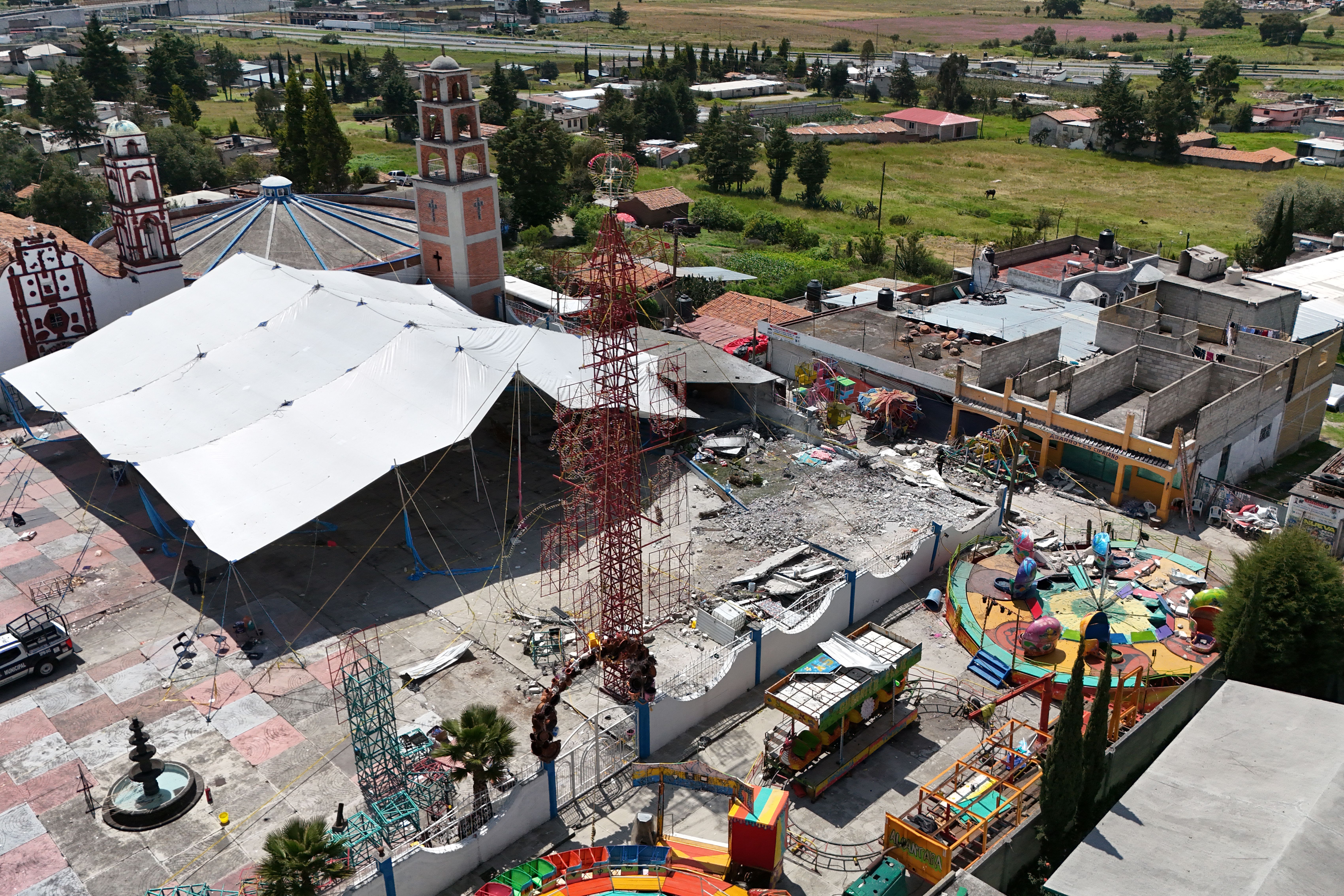 This aerial view shows the site of a fireworks blast during a patronal festival in Santa Maria Canchesda, Mexico state, Mexico on September 6, 2026.
