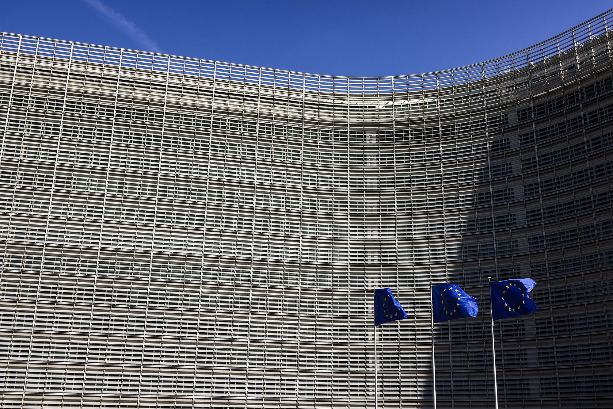European Union flags fly in front of the European Commission headquarters in Brussels, Belgium, on September 10, 2026.