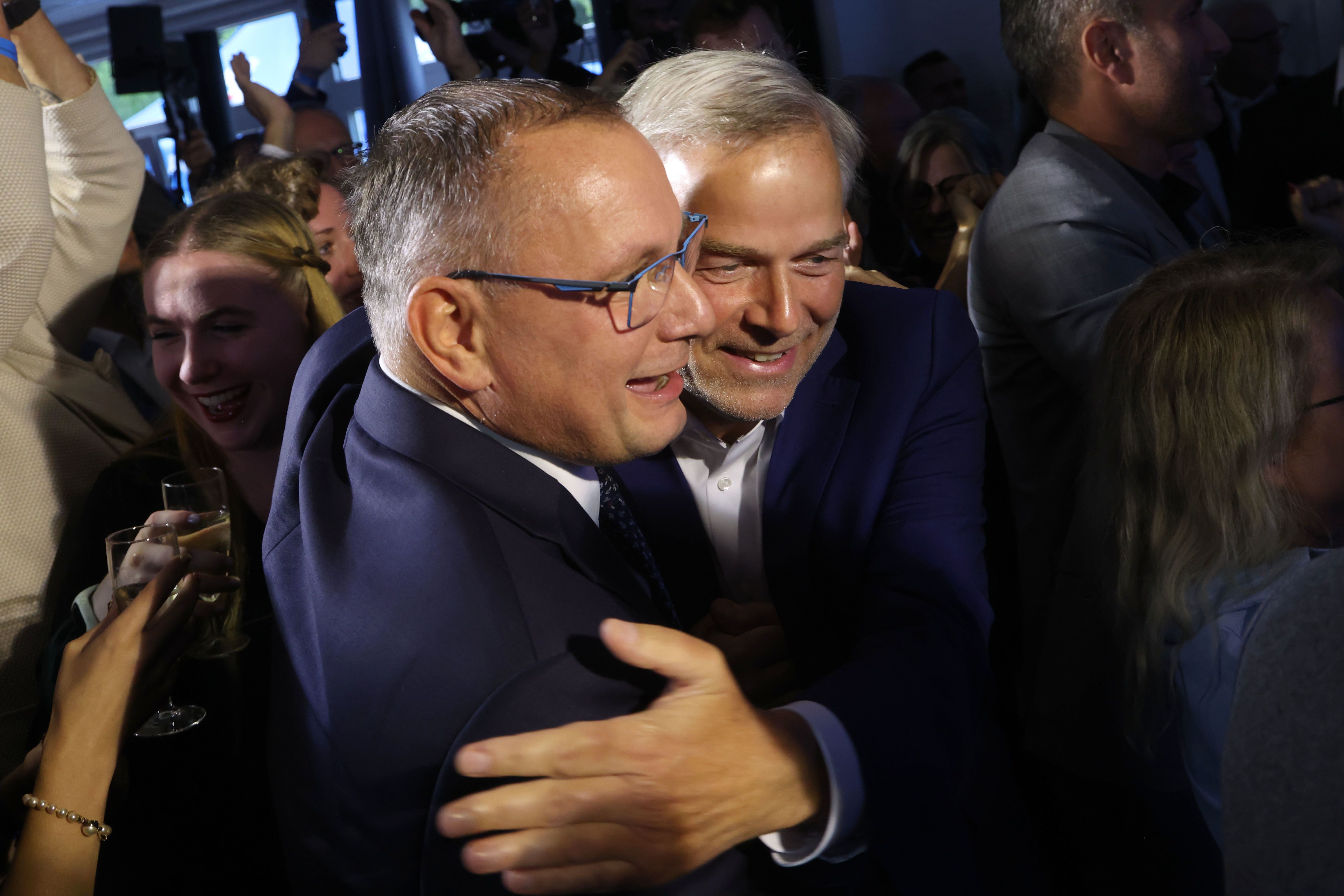 AfD party co-leader Tino Chrupalla and Leif-Erik Holm, lead candidate of the far-right Alternative for Germany (AfD), react to preliminary results in Mecklenburg-Vorpommern.