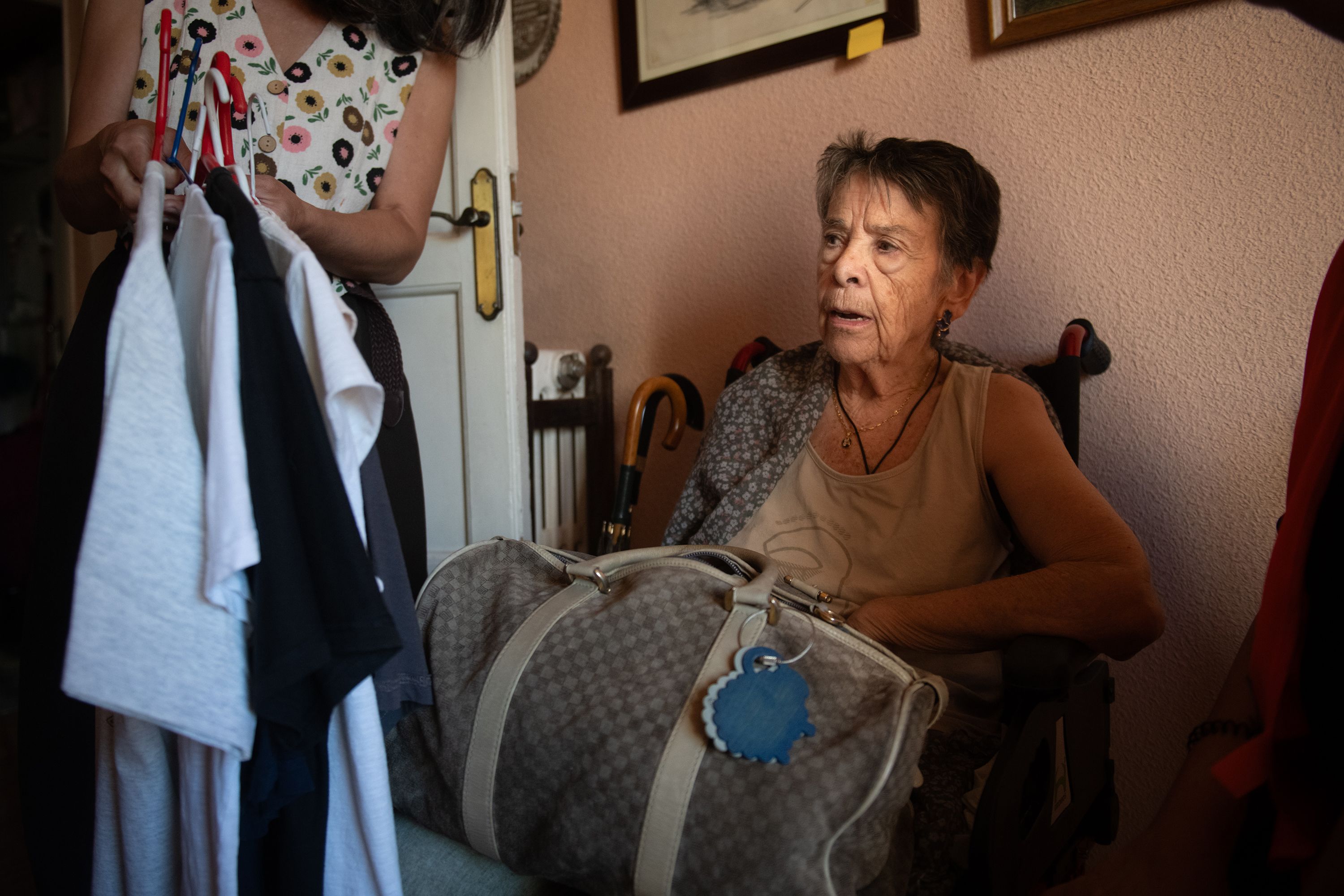 Maricarmen packs a bag with her belongings before being evicted from her home in Madrid, Spain, on September 23.