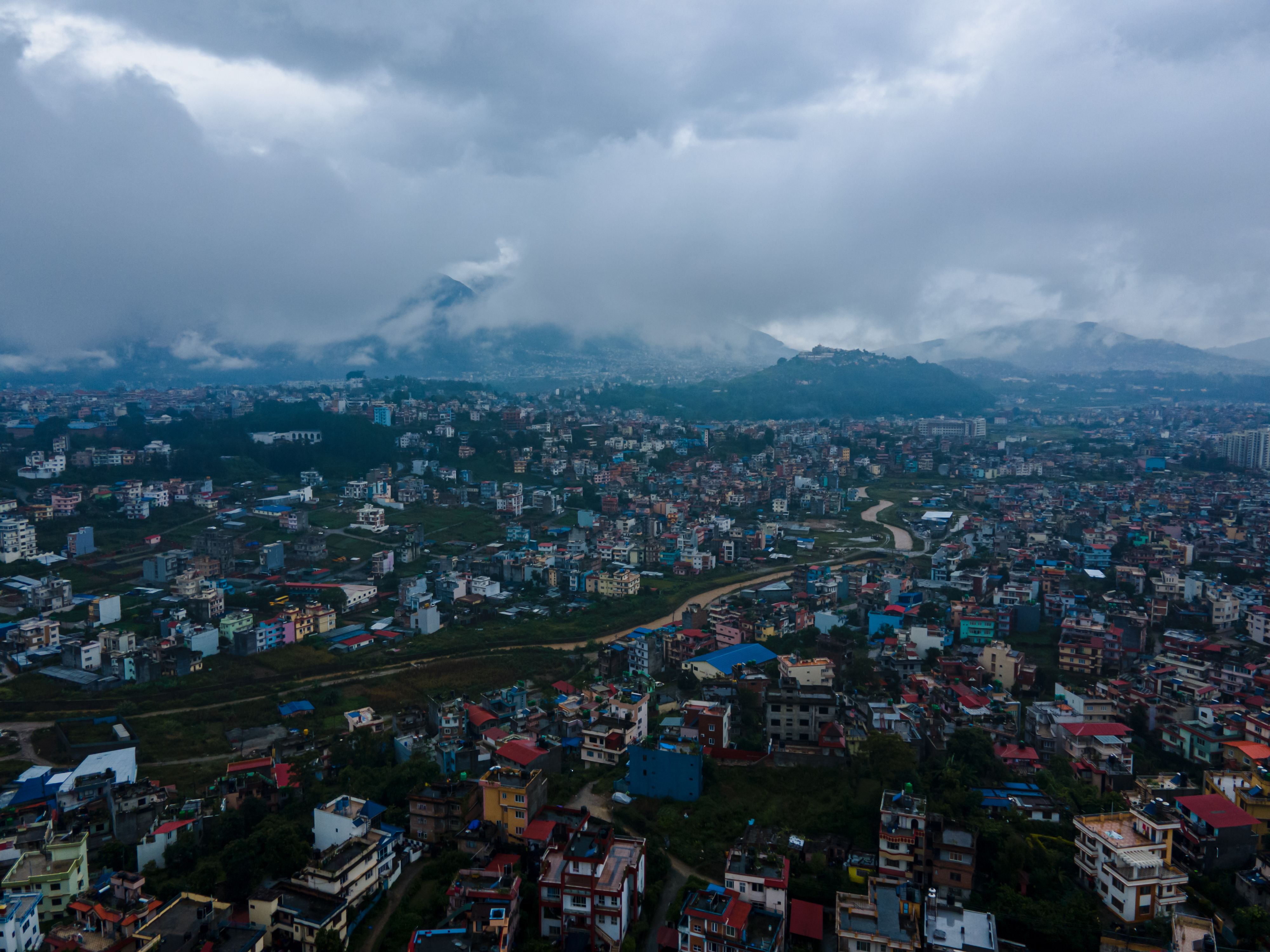 An aerial view of the cityscape under rainy skies in Lalitpur, Nepal, on September 27, 2026. Rainfall disrupts daily activities as a deep depression over the Bay of Bengal influences weather conditions in the region.