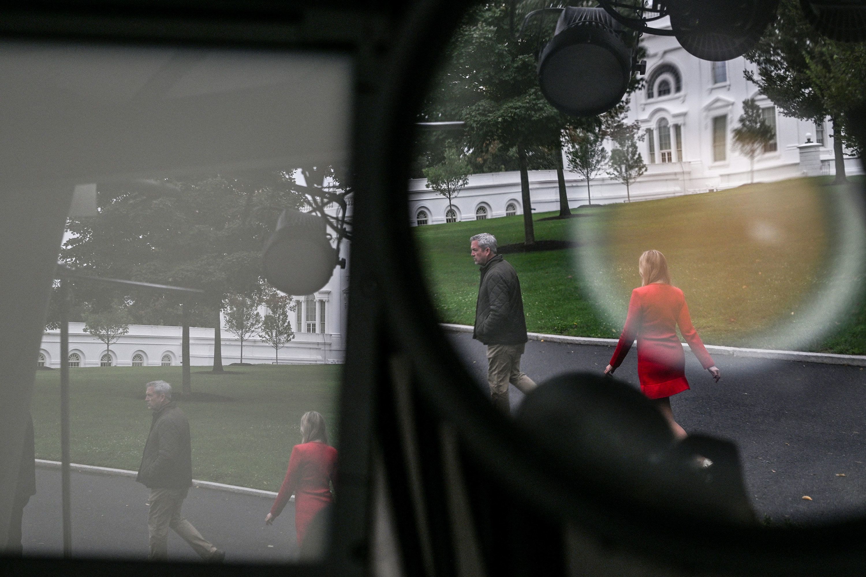 Journalists walk past broadcast news workspaces outside the White House in Washington, DC, on September 23, 2026, prior to journalists from three banned outlets returning. (Photo by Alex Wroblewski / AFP via Getty Images)