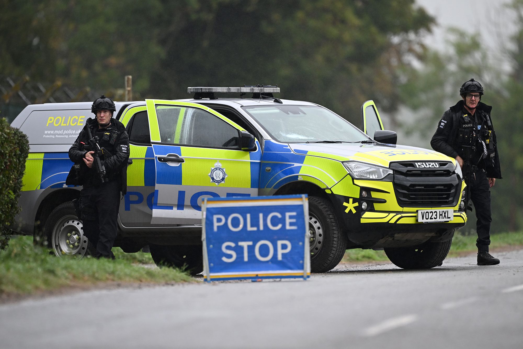 Armed police maintain road blocks and security checks around RAF Fairford on September 27.