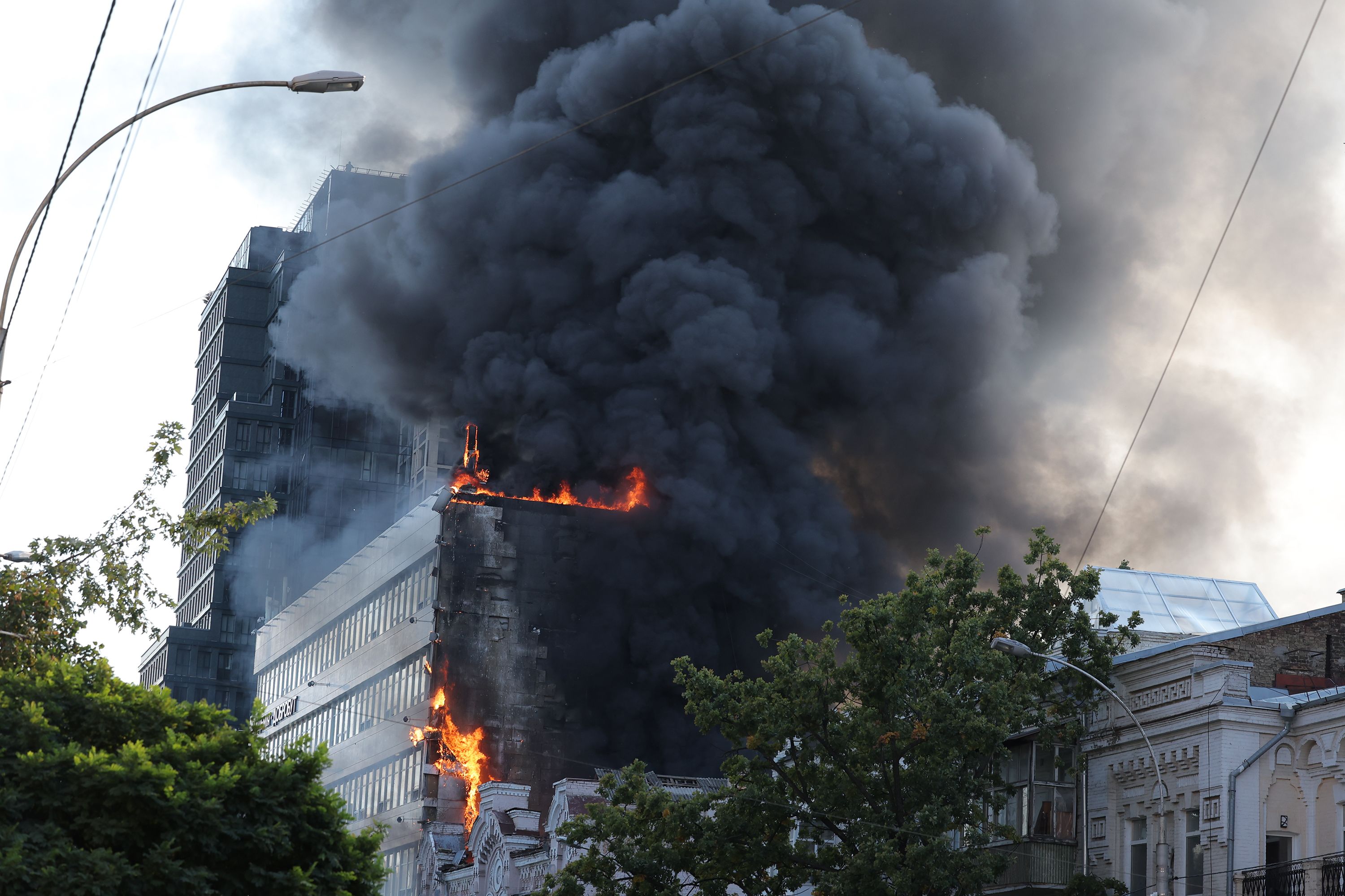 A medical facility hit by a Russian drone burns in Kyiv, Ukraine, on September 28.