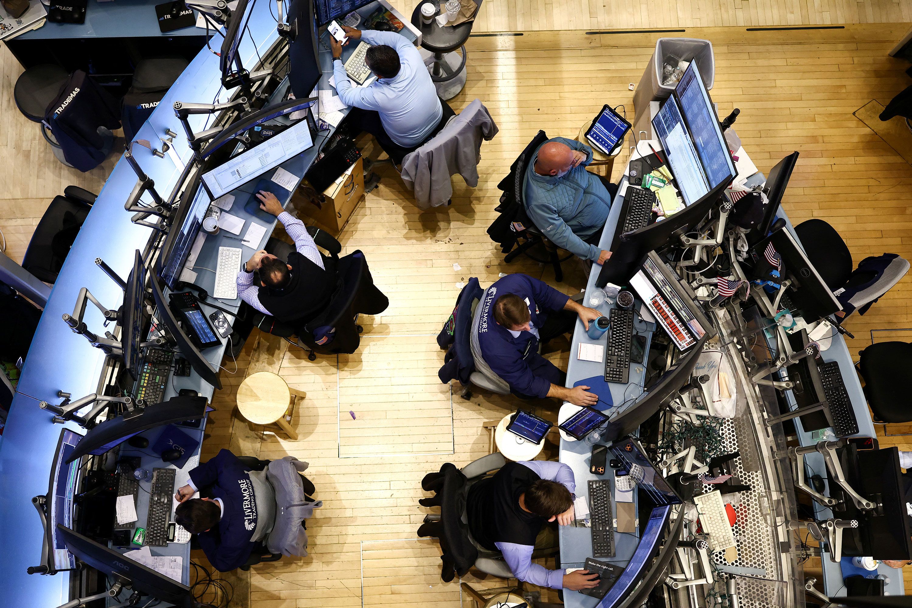Traders work on the floor of the New York Stock Exchange at the opening bell, in New York on September 28, 2026.