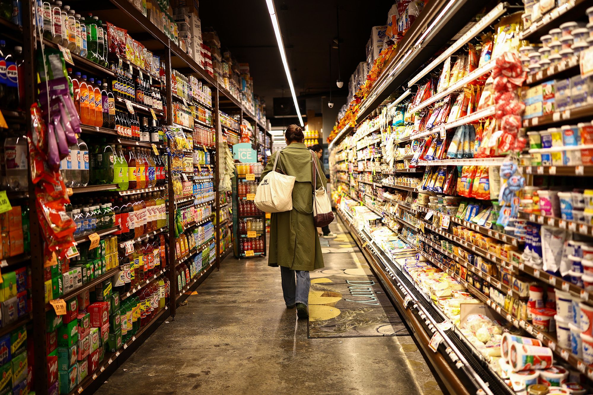 A customer walks down the aisle in a supermarket in the Sugar Hill neighborhood of Manhattan in New York on September 28, 2026.