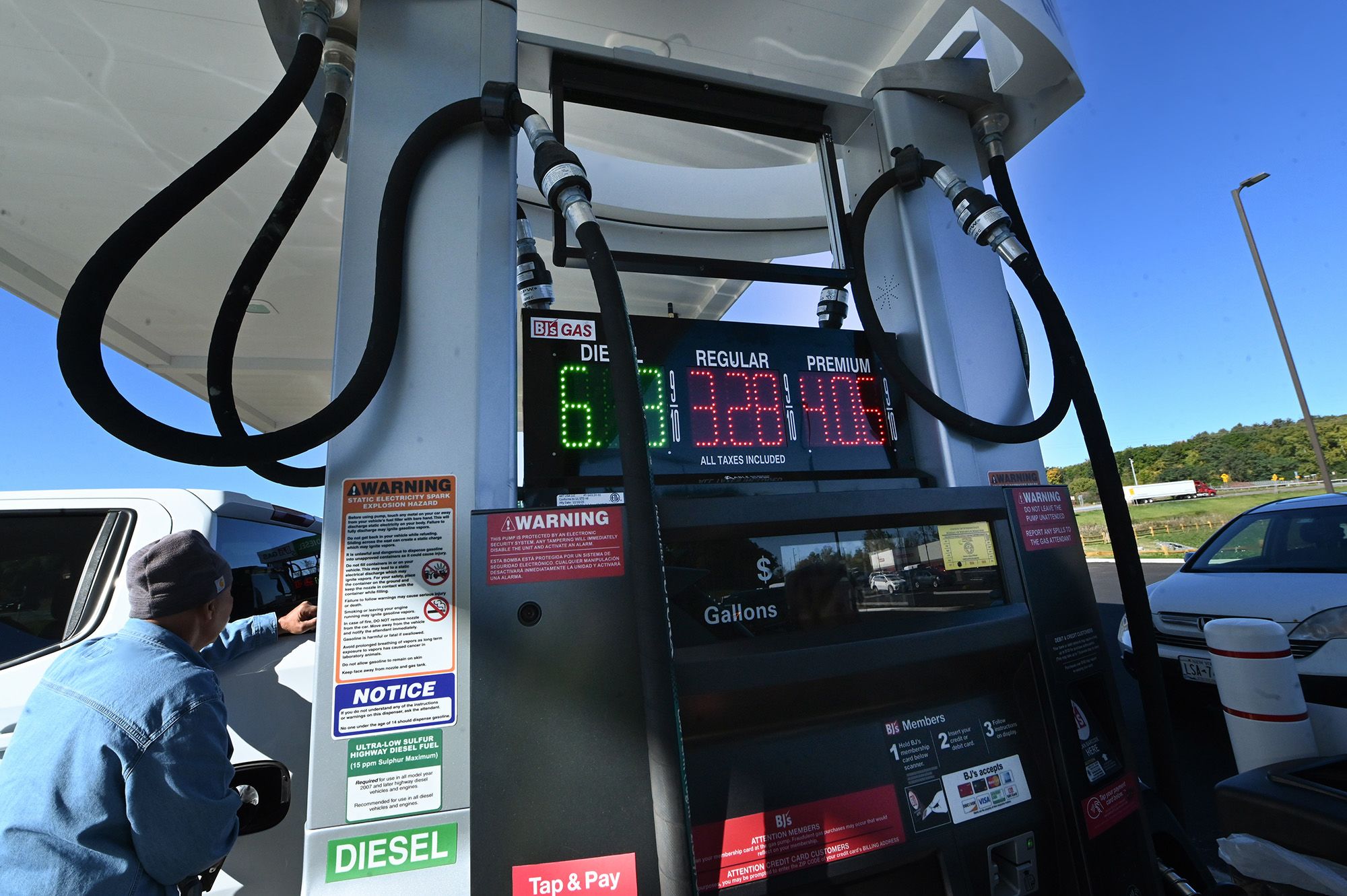 David Rotundo of Blue Mountain Lake fills his pickup truck with gasoline on October 6, 2026, in Rotterdam, New York.