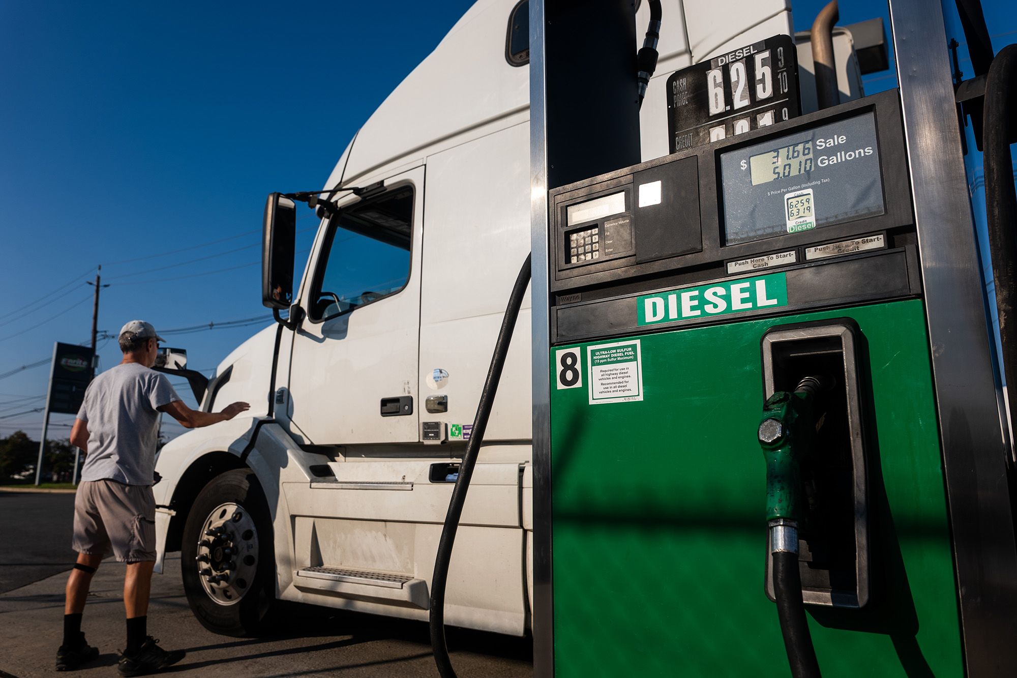 A gas station employee fills a truck up with diesel fuel on October 16, 2026 in Bayonne, New Jersey. The surging price of diesel fuel, used in everything from commercial trucks to many SUVs and recreational vehicles, has become a major issue in the upcoming midterm elections. The rising price of diesel fuel has trickled through the American economy, affecting the cost of food, clothing, and other daily staples.