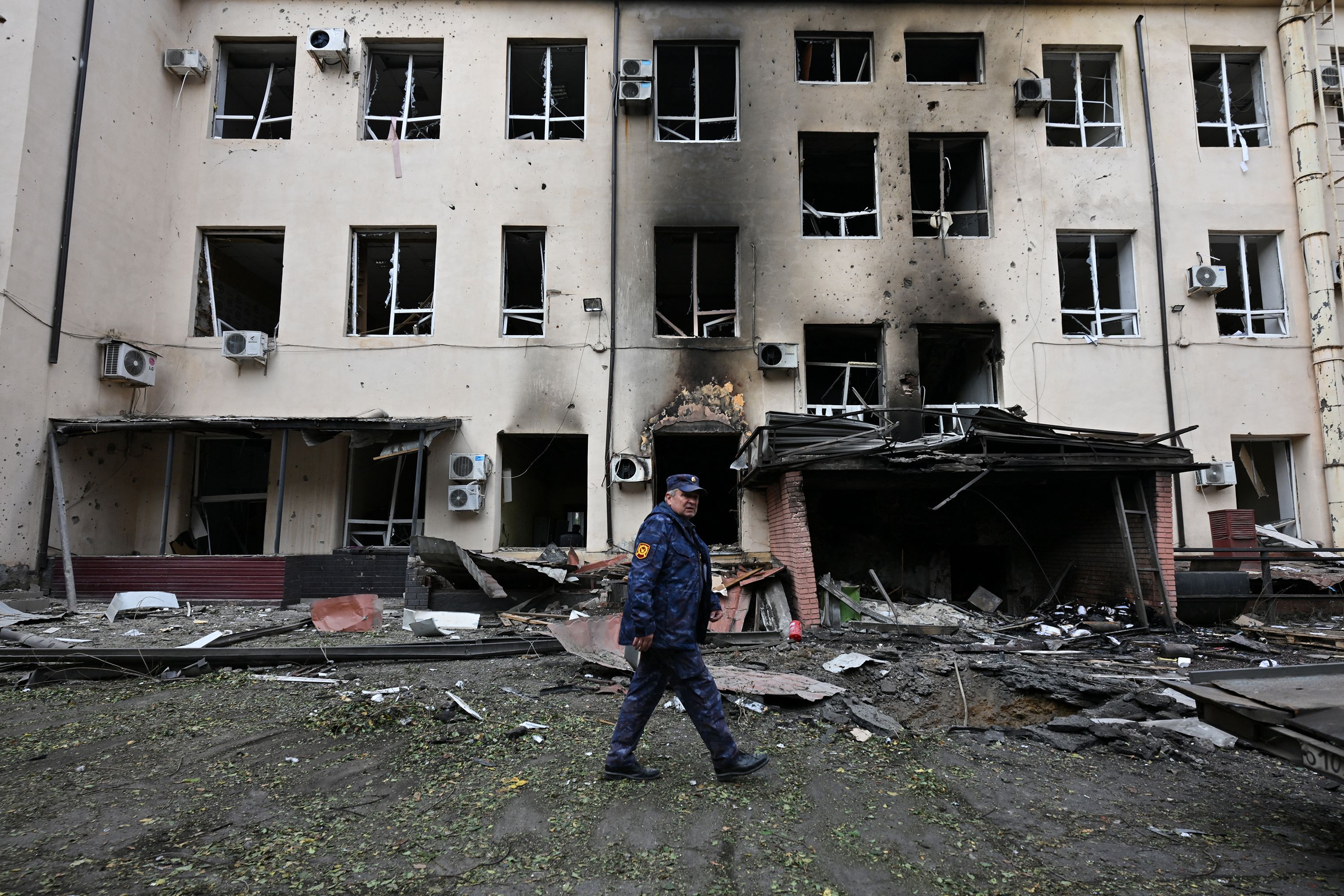 A photograph shows the aftermath of an overnight attack in central Donetsk, Russian-controlled Ukraine, which local Russian-installed officials called a Ukrainian drone strike, on October 20, 2026, amid the ongoing Russian-Ukrainian conflict.