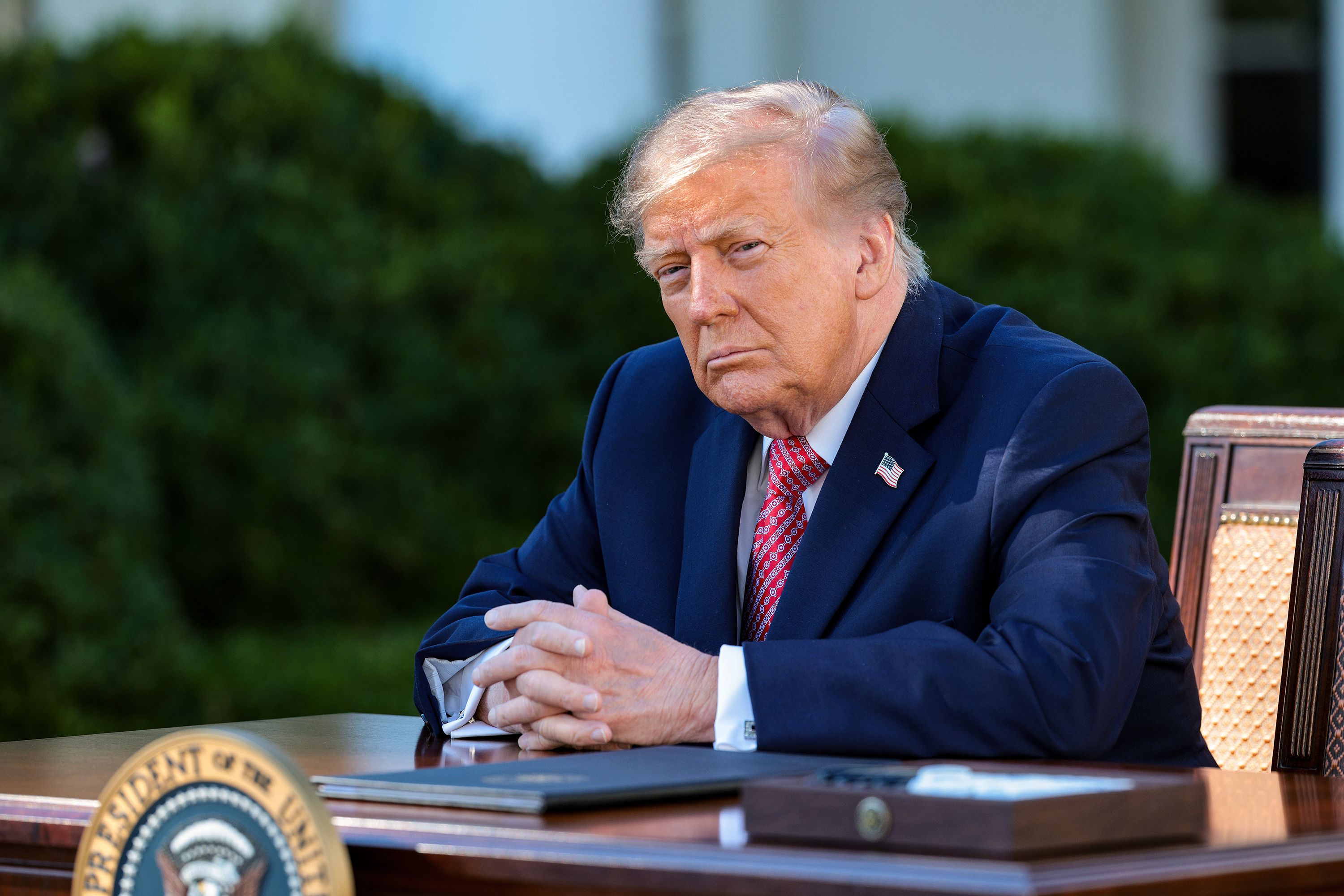 President Donald Trump at the White House on October 19, 2026. Trump ignited bipartisan uproar over the weekend by signing an executive order that waives Russia-related sanctions before they kicked in.
