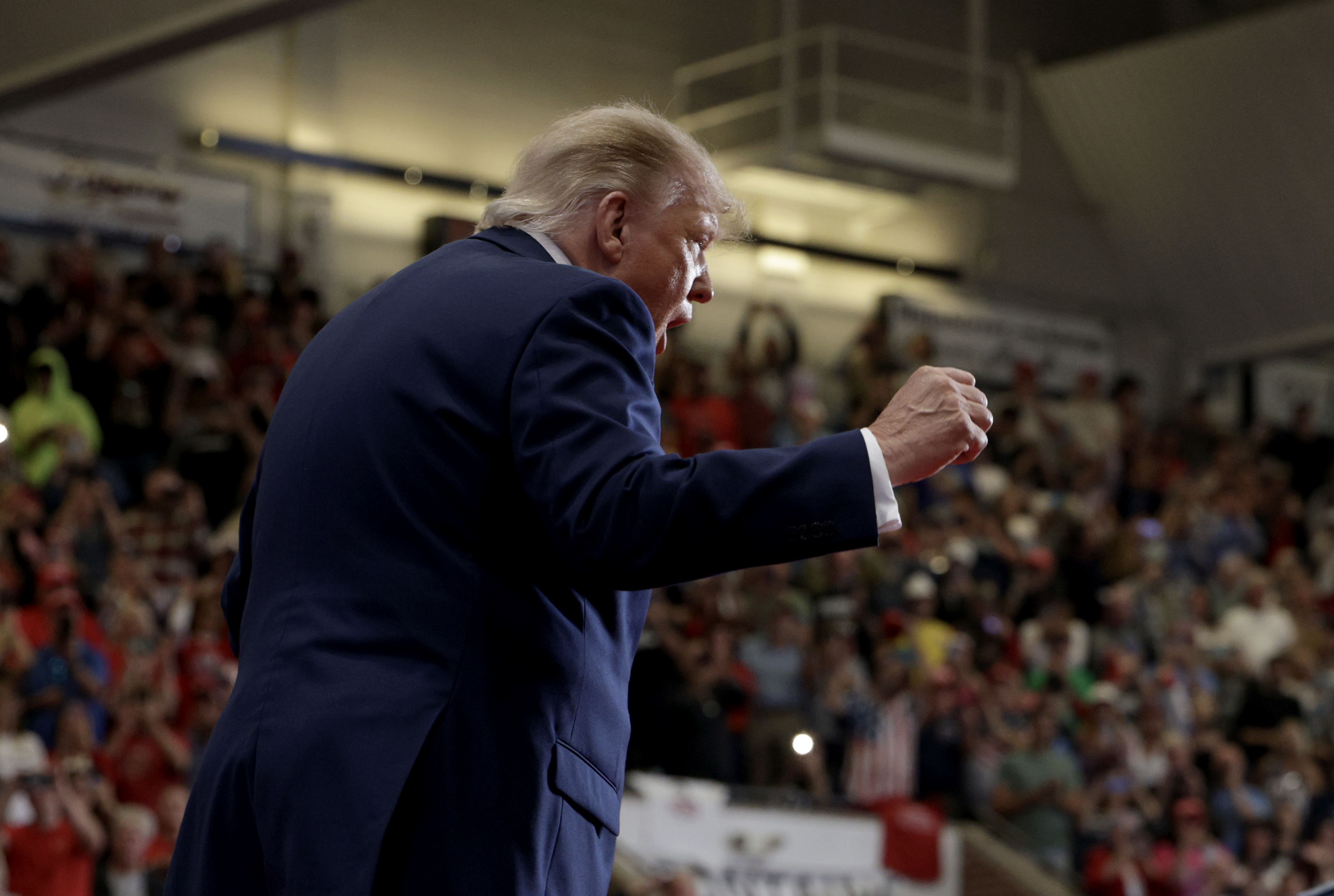 President Donald Trump arrives on stage to deliver remarks during an election rally at McMorran Place Sports & Entertainment Center in Port Huron, Michigan, on October 25, 2026.