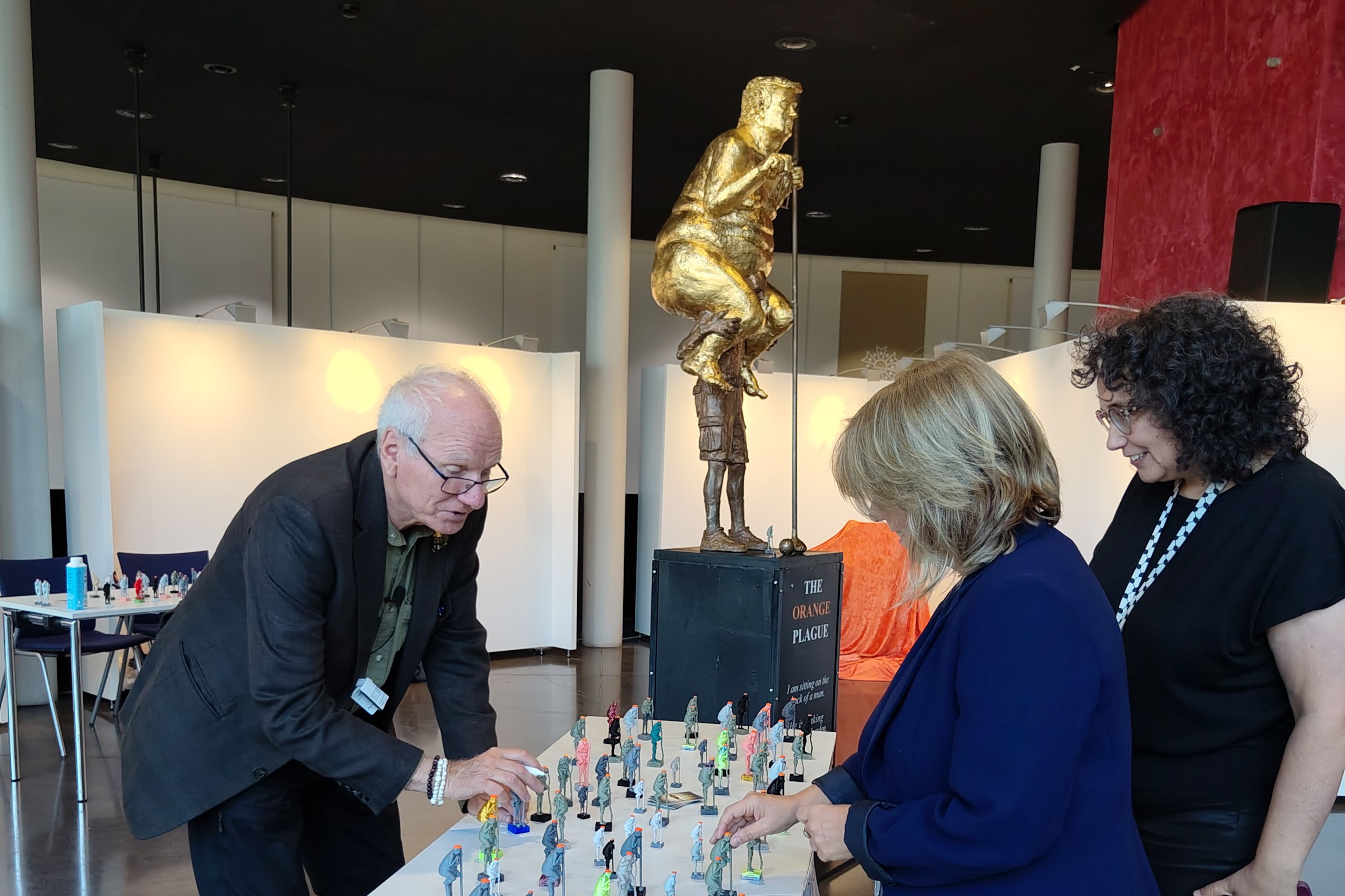 Titled “The Orange Plague,” the artwork has been installed in Strasbourg, France, which — along with Brussels and Luxembourg — hosts one of the European Union’s three parliament buildings.