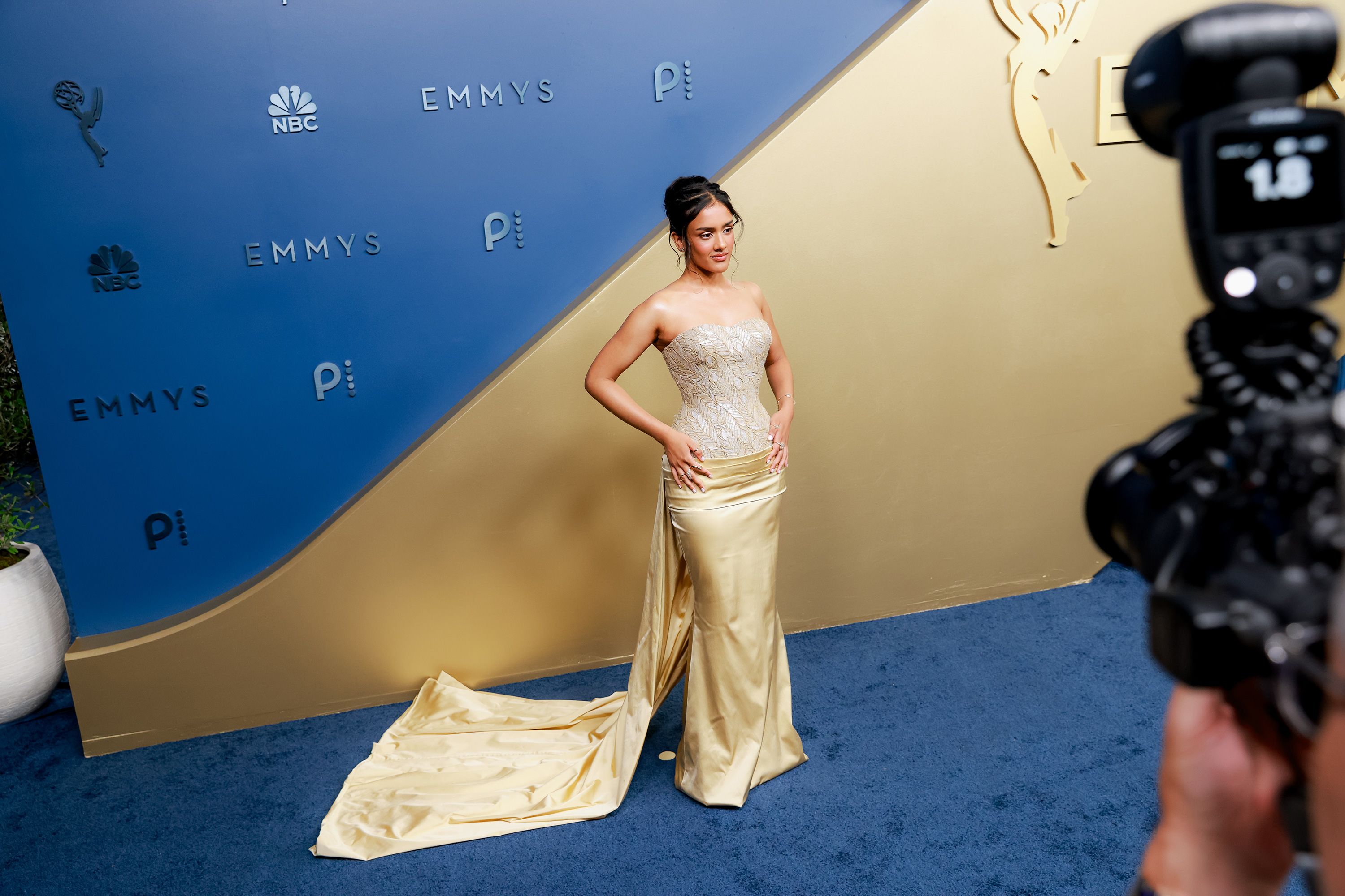 “The Pitt” star Shabana Azeez was draped in gold with a feather-like textured bodice.