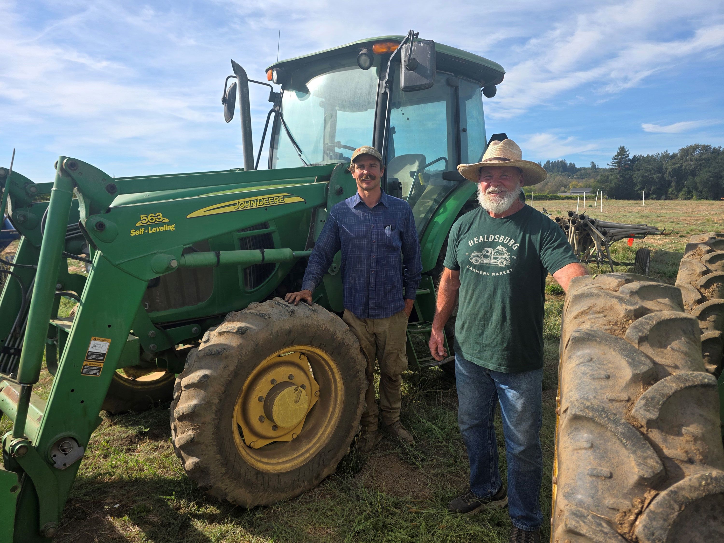 Sammy Tookey, left, and his stepfather, George Kibby, grow vegetables and fruits in northern California.