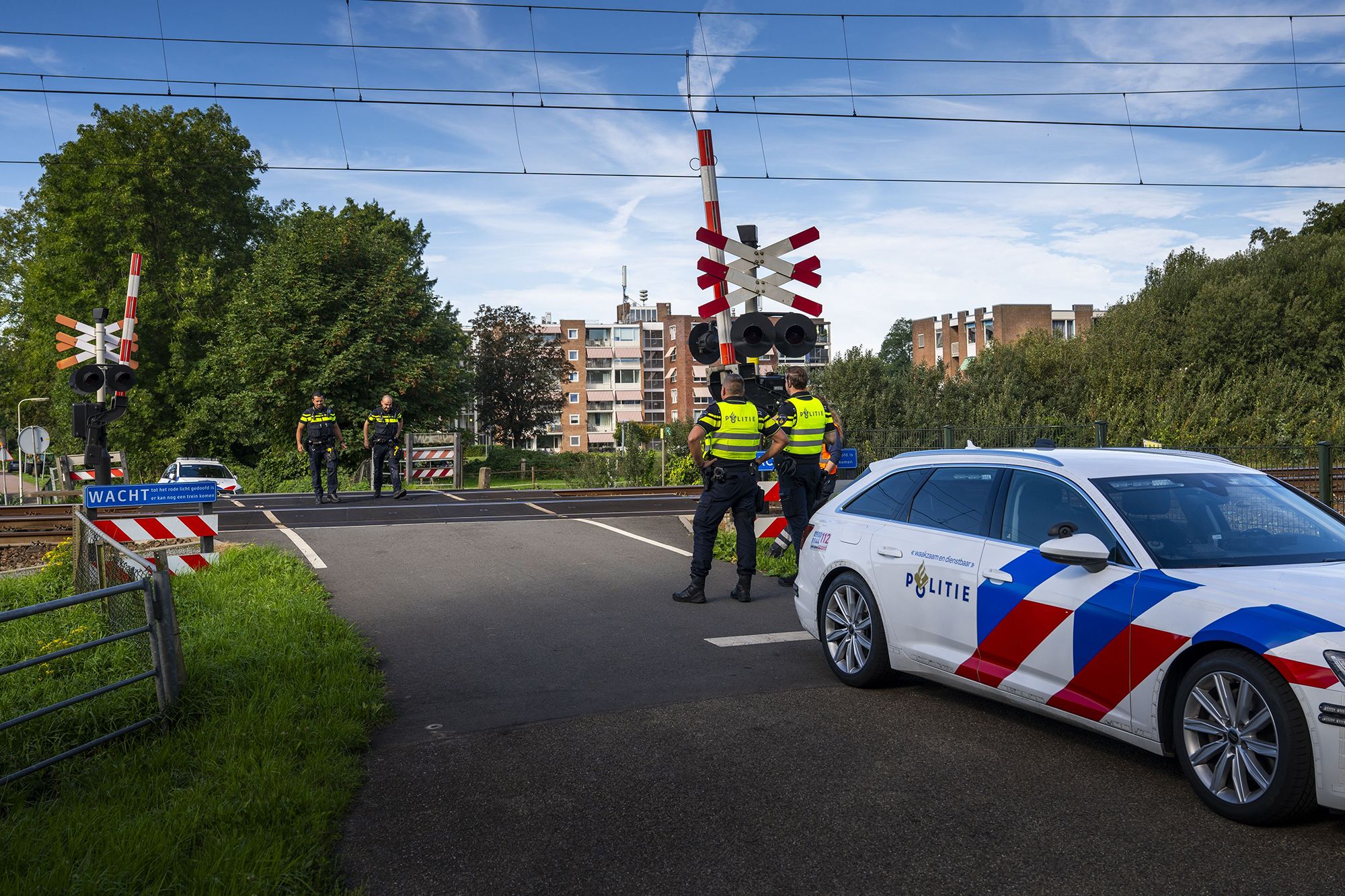 ProRail and police employees search the tracks in Zwolle, Netherlands, on Tuesday after suspected sabotage led to huge rail disruption across the country.