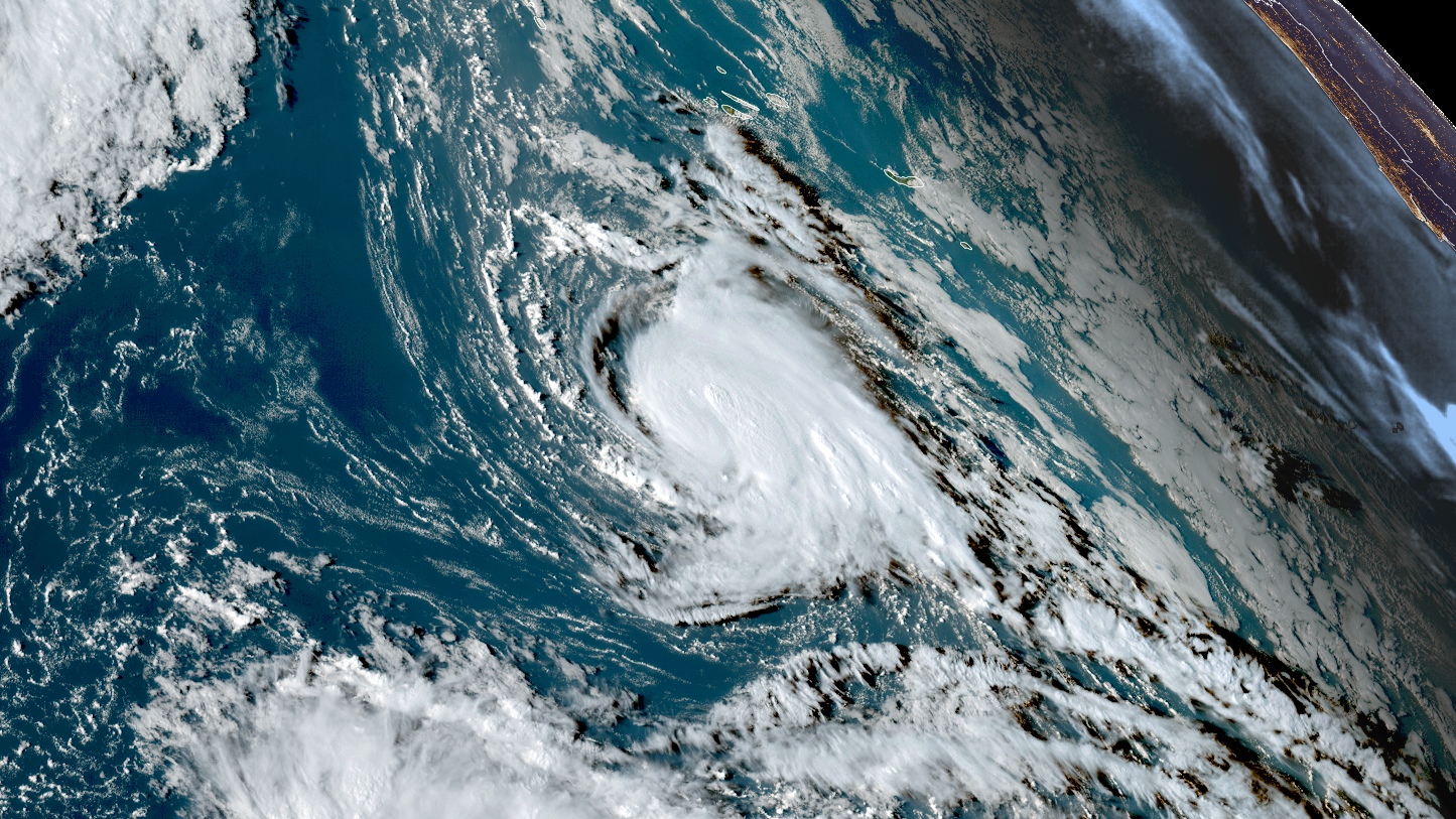 Satellite view of Tropical Storm Fay several hours before it strengthened into a 70-mph tropical storm in September.