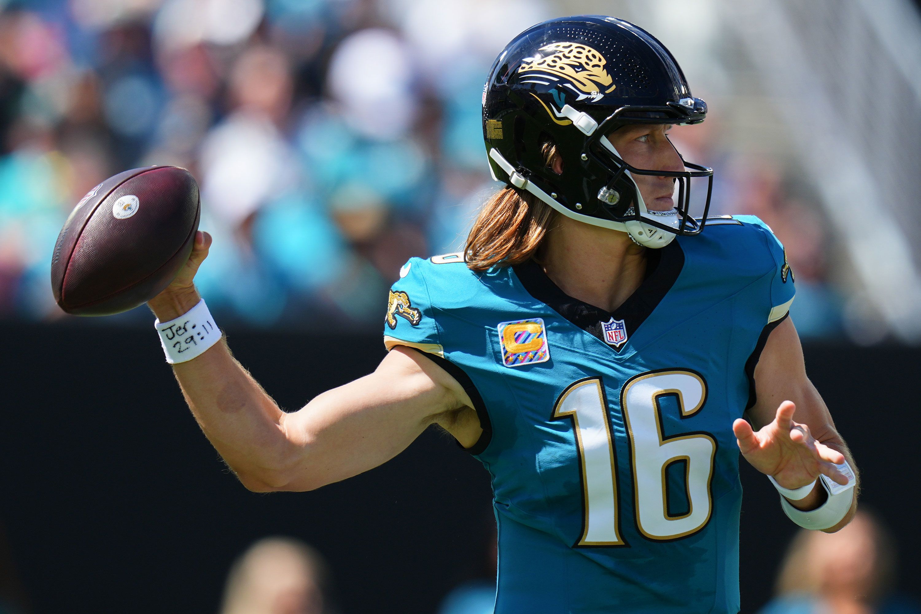 Trevor Lawrence, of the Jacksonville Jaguars, throws a pass against the New England Patriots during the second quarter at EverBank Stadium on September 27, 2026, in Jacksonville, Florida.