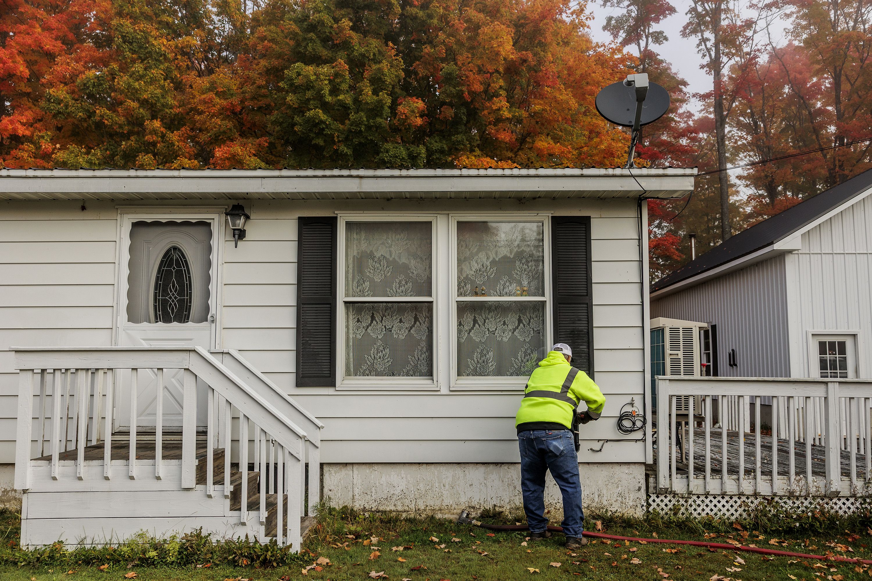 Bates Fuel driver Lee Wood delivers heating oil to residents in Aroostook County, Maine, on October 1, 2026. Bates Fuel is making smaller deliveries and letting customers run on credit to cope with rising fuel costs.
