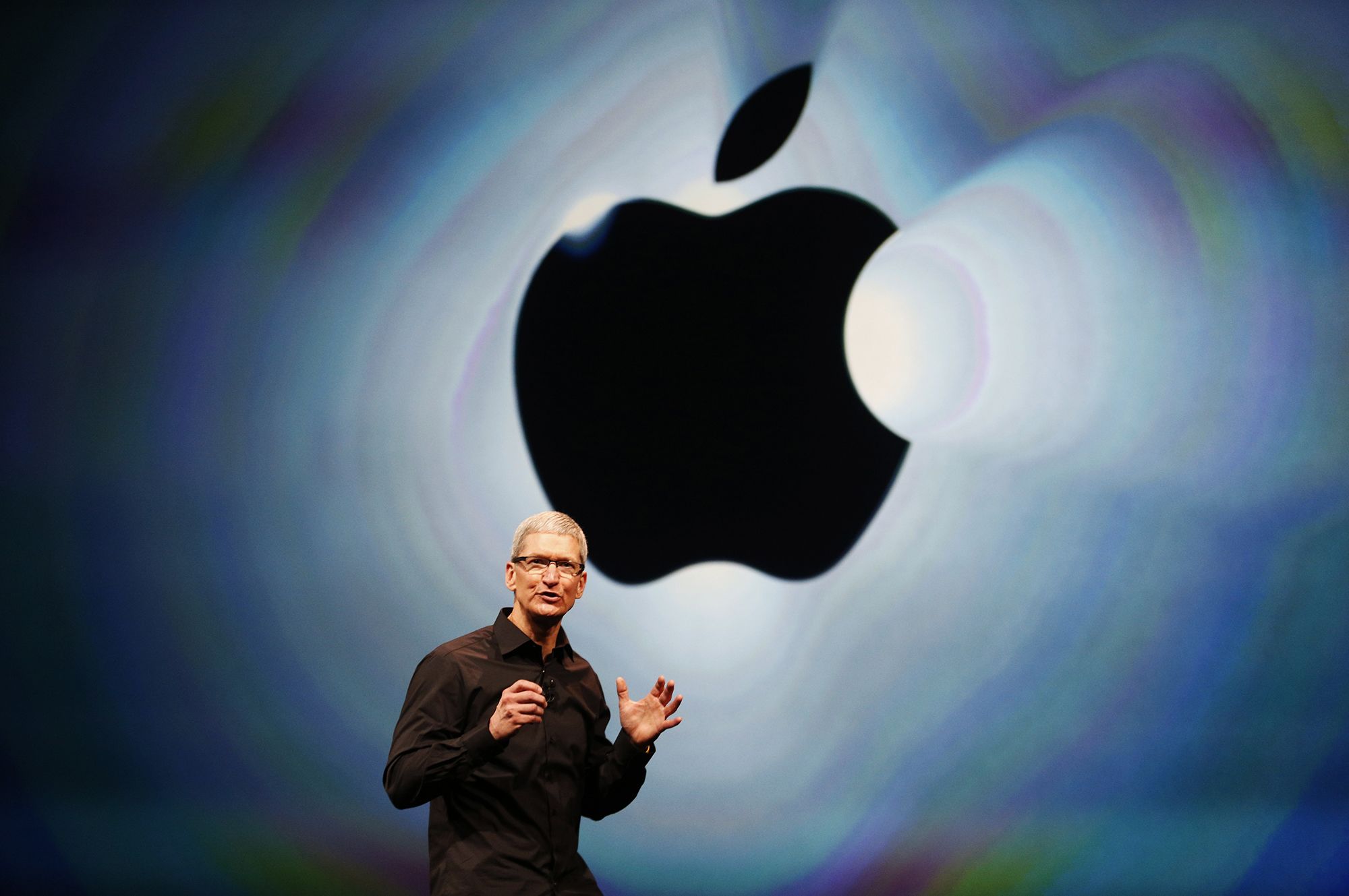 Apple CEO Tim Cook takes the stage during Apple's iPhone media event in San Francisco, California, on September 12, 2012.