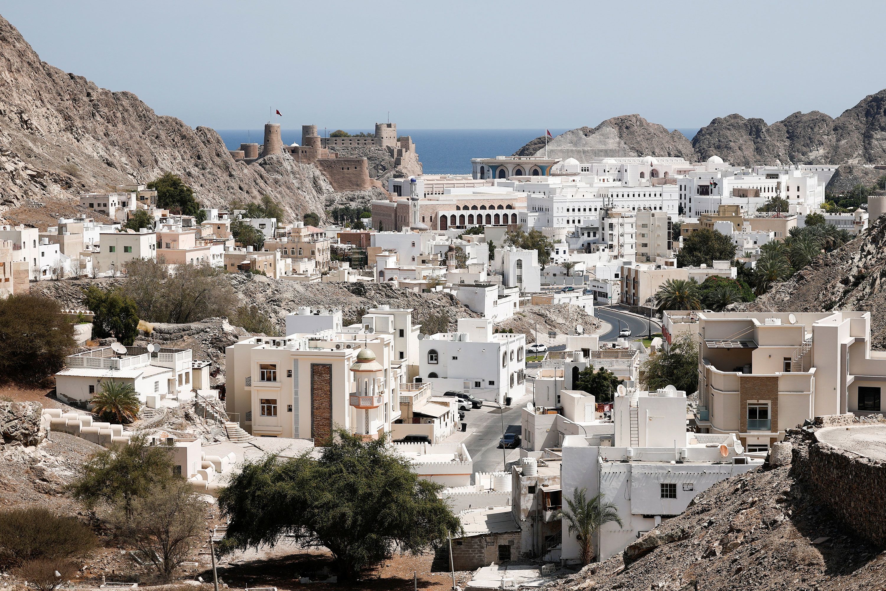 The Al Mirani Fort and traditional houses are surrounded by mountains, amid the U.S.-Israeli conflict with Iran, in Muscat, Oman, March 12, 2026. REUTERS/Benoit Tessier