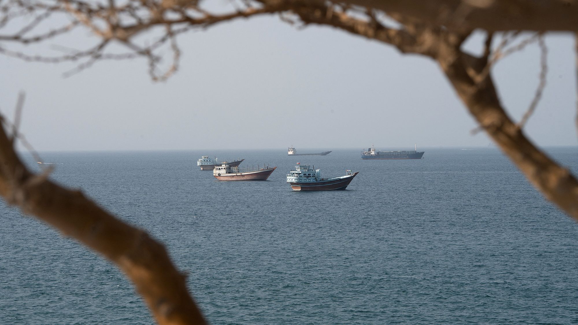 Vessels near the Strait of Hormuz, as seen from Musandam, Oman, August 17, 2026.