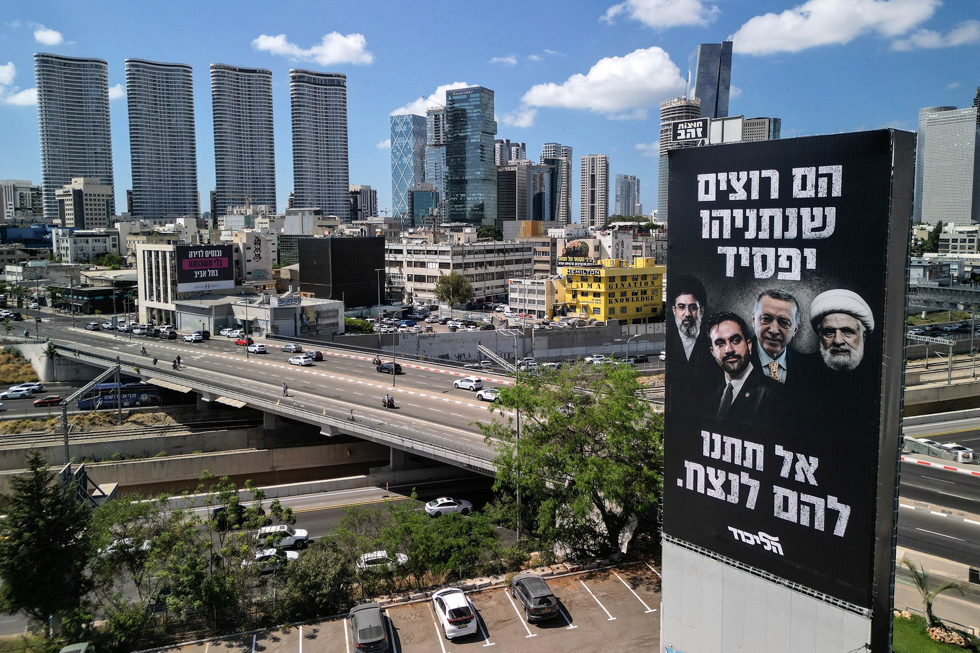 A drone view of an election billboard by Benjamin Netanyahu's Likud Party depicting Iran's Supreme Leader Mojtaba Khamenei, New York City Mayor Zohran Mamdani, Turkish President Tayyip Erdogan and Hezbollah chief Naim Qassem and a text in Hebrew that reads "They Want Netanyahu to Lose, Don't let them Win", in Tel Aviv, Israel August 17, 2026 REUTERS/Amir Cohen