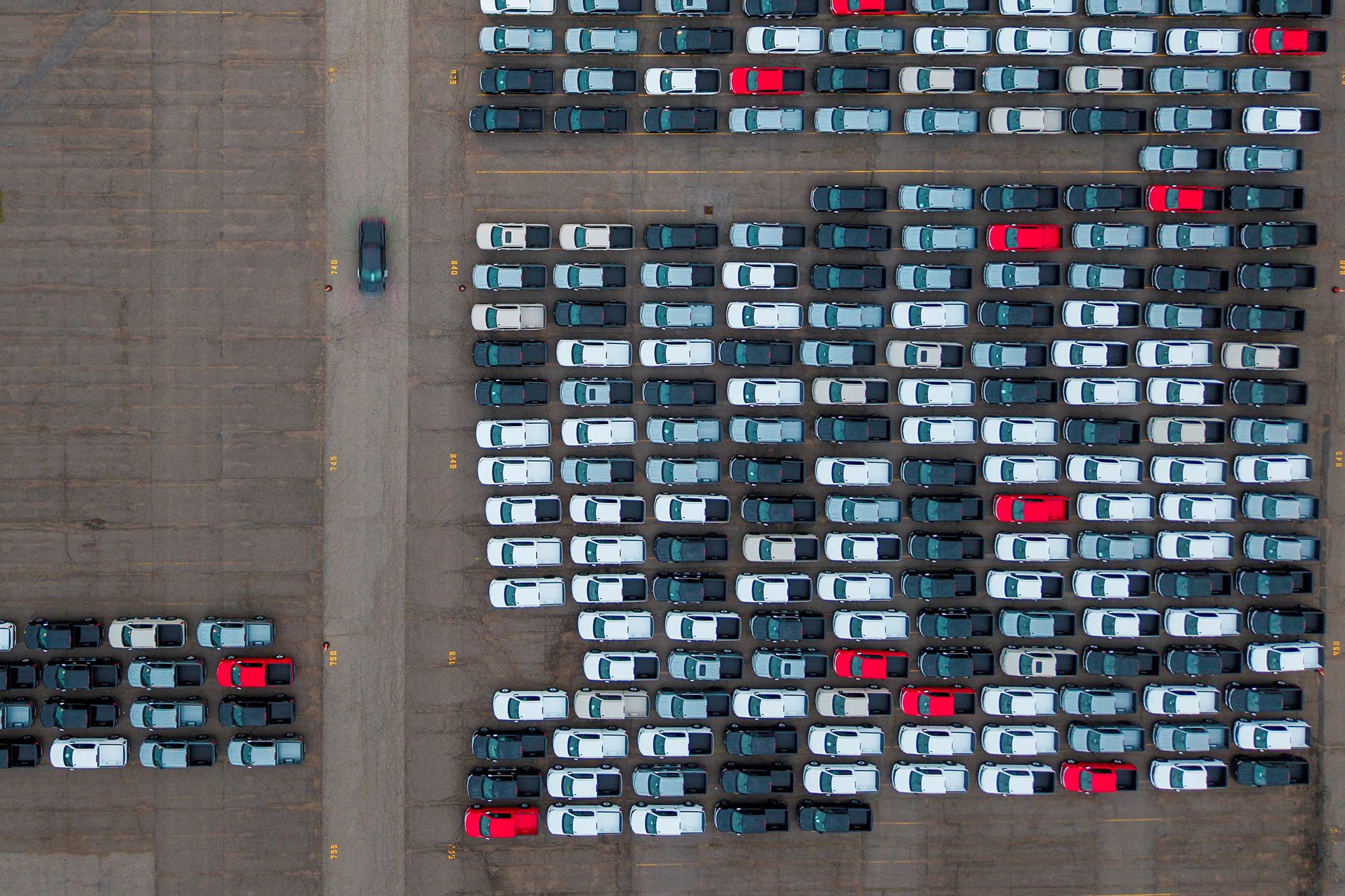 Vehicles parked outside the GM Assembly plant in Oshawa, Ontario. President Donald Trump has announced plans to impose a 50% tariff on Canadian cars and auto parts as of January 1.