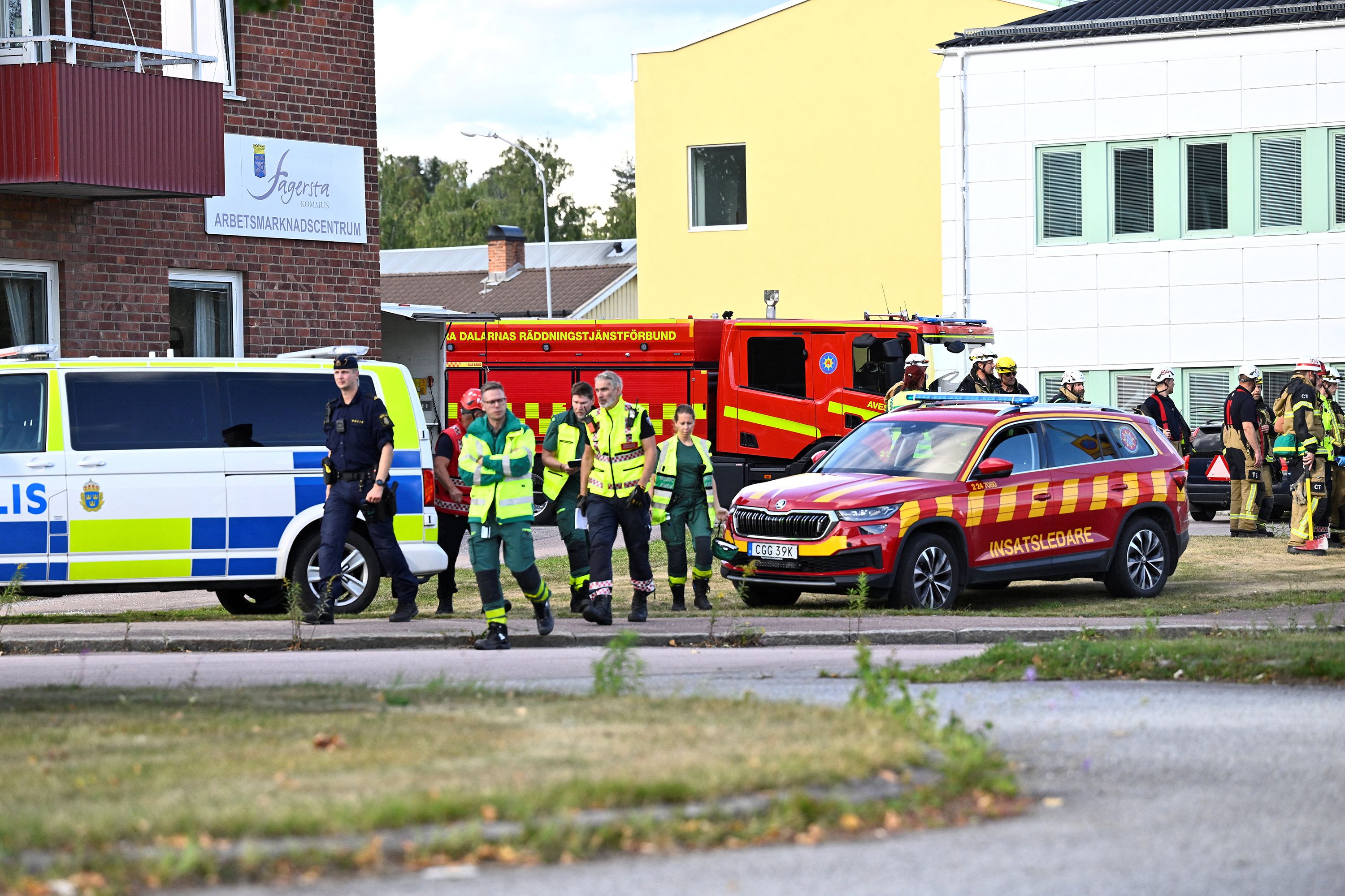 Police and emergency personnel survey Brinell high school in central Sweden, after several people were injured by a person armed with a sword, on August 21, 2026.