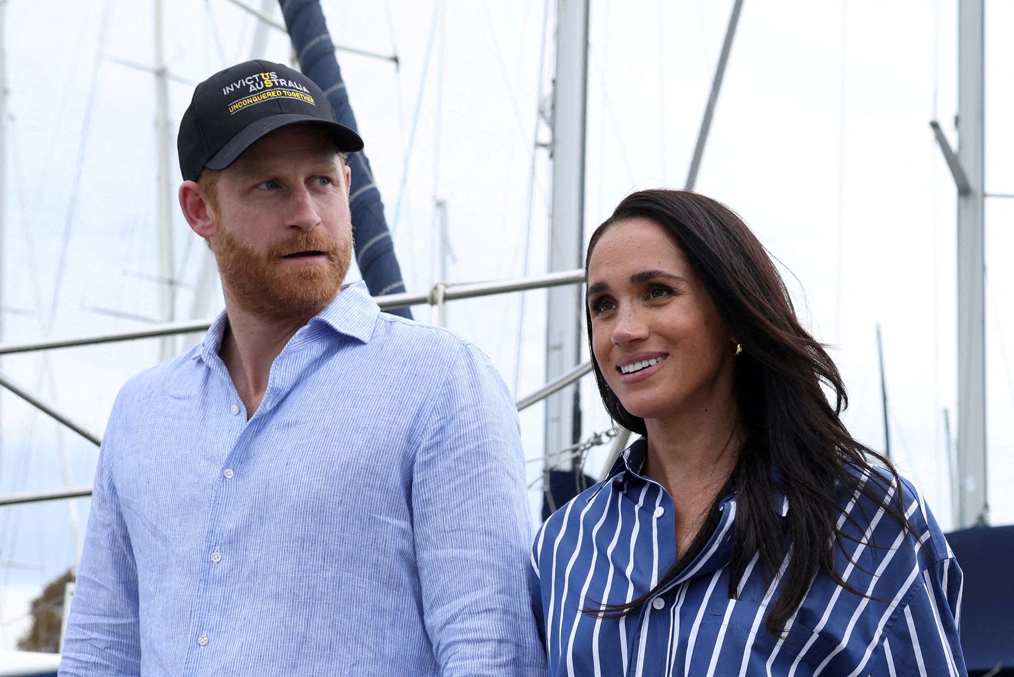 Prince Harry and Meghan, the Duke and Duchess of Sussex, disembark after sailing on Sydney Harbour, Australia, in April.