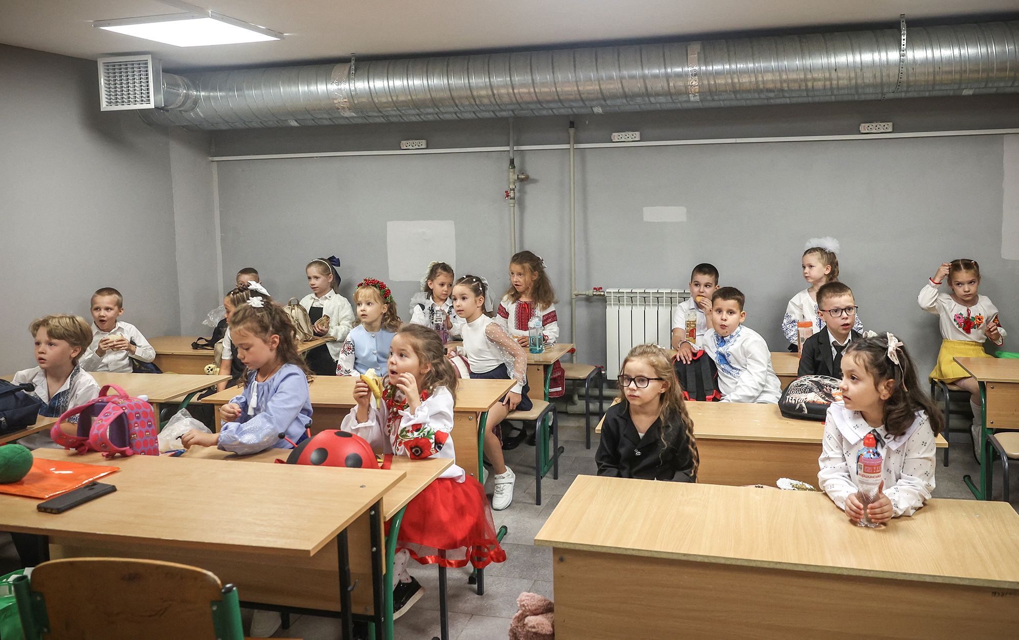 First-graders have their first day of the new academic year inside school shelter during Russian drone strike, amid Russia's attack on Ukraine, in Kyiv, Ukraine September 1, 2026. REUTERS/Alina Smutko