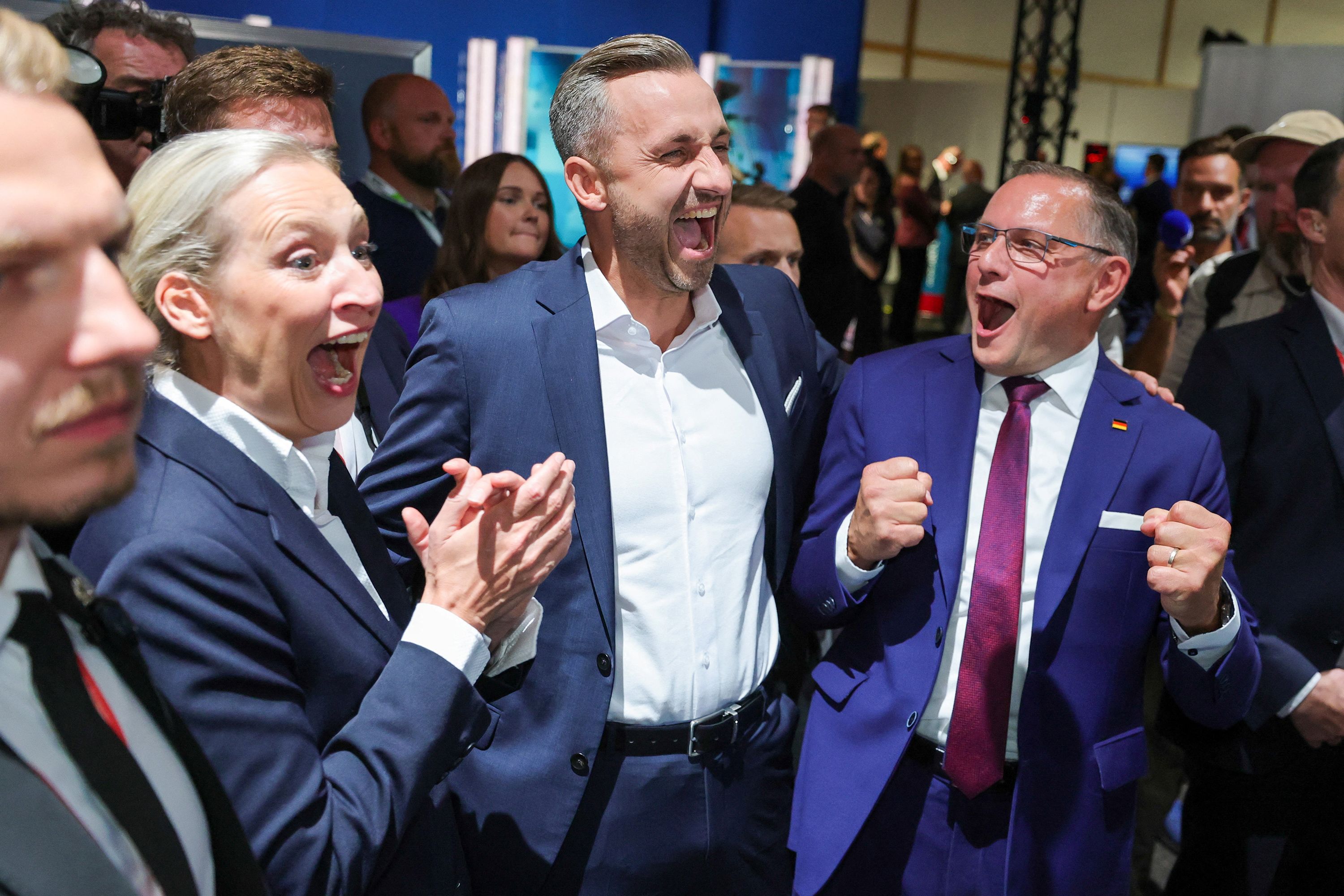 Top candidate of the far-right Alternative for Germany (AfD), Ulrich Siegmund, with party co leaders Alice Weidel and Tino Chrupalla, reacts after polls closed, on the day of the Saxony-Anhalt state elections, in Magdeburg, Germany, September 6, 2026.