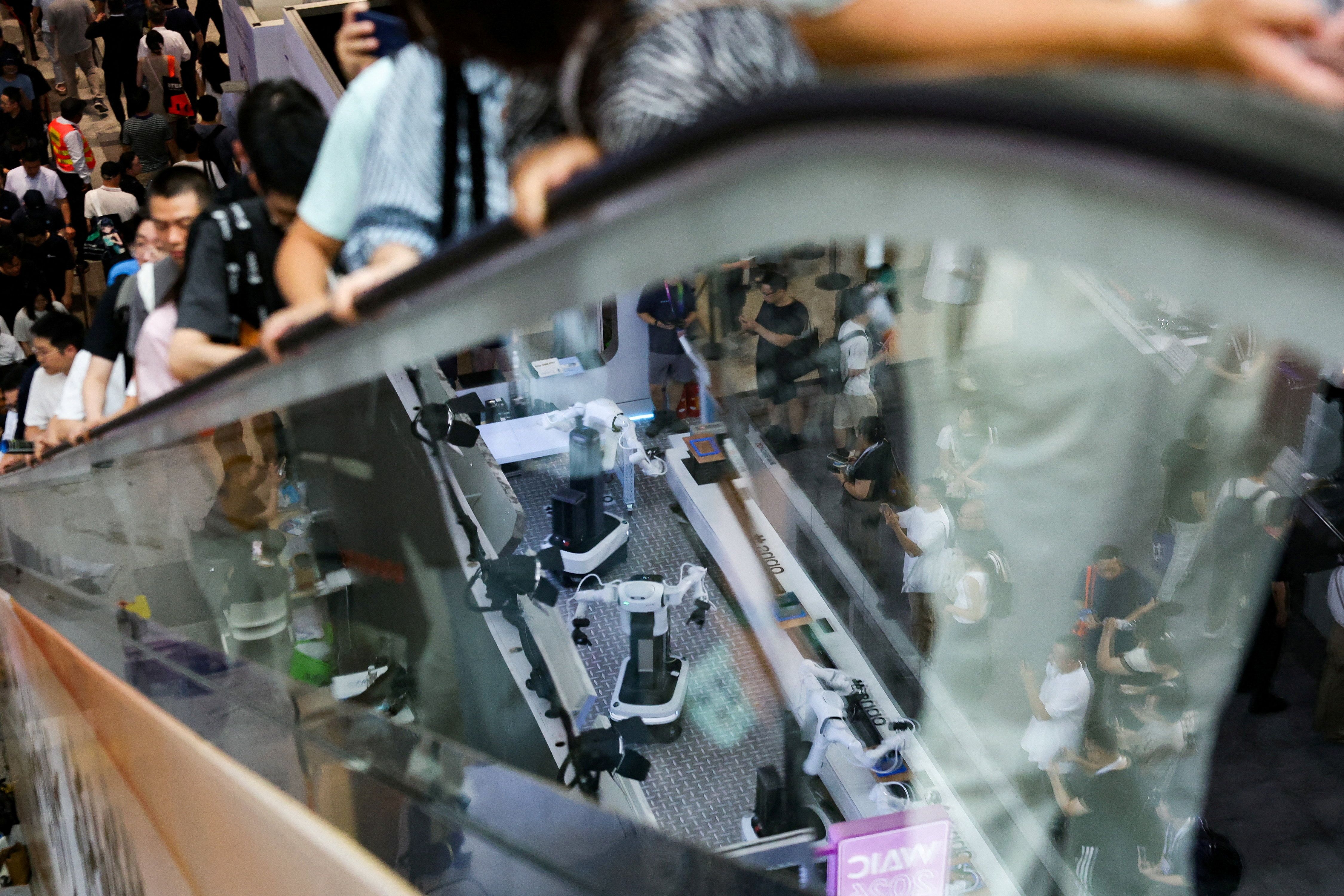 People visit the World Artificial Intelligence Conference (WAIC) in Shanghai, China, July 18, 2026.