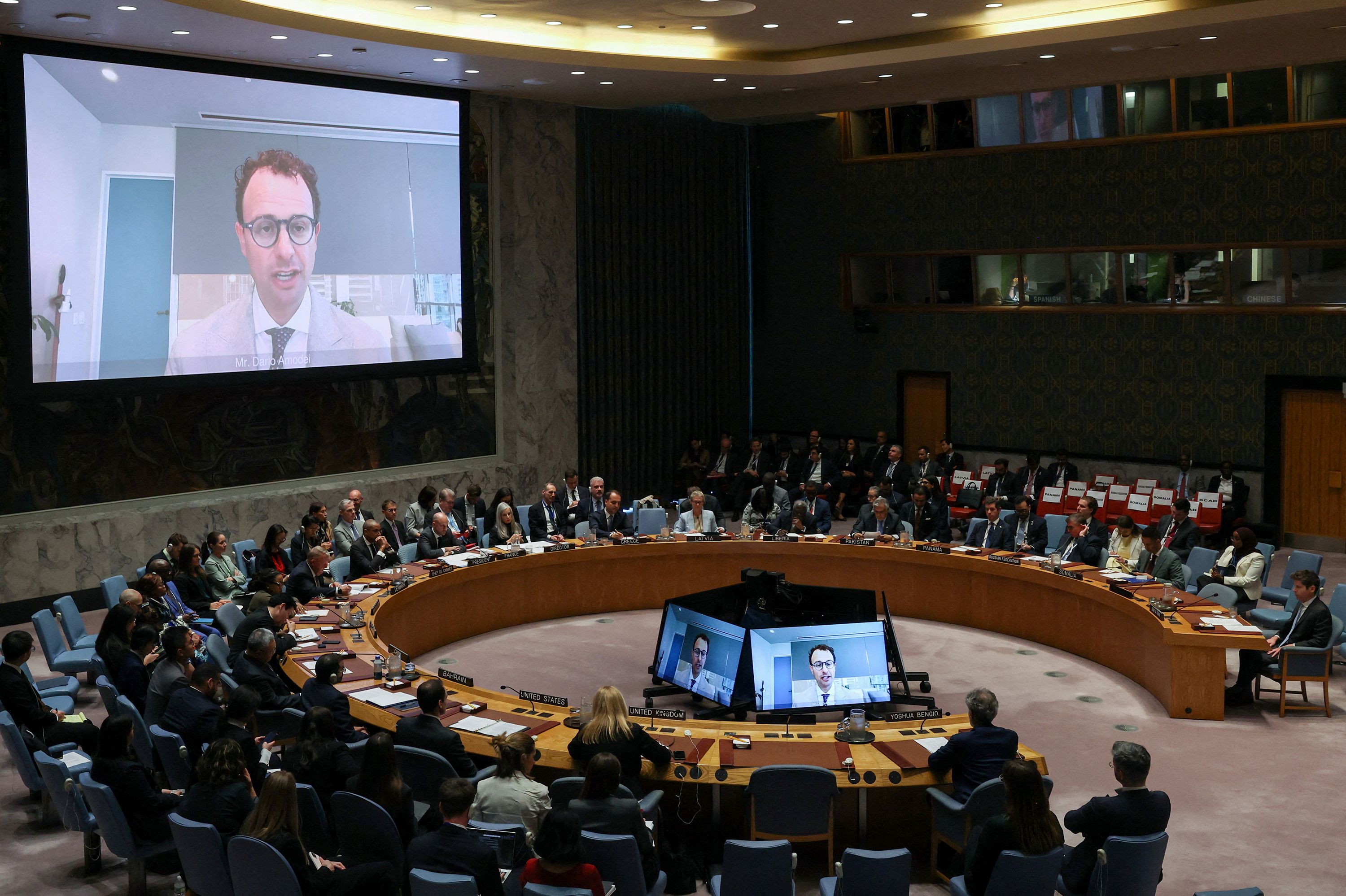 Dario Amodei, co-founder of Anthropic, via video link, and OpenAI CEO Sam Altman address the United Nations Security Council during a session on Artificial Intelligence during the 81st United Nations General Assembly at UN Headquarters in New York City, on September 23.