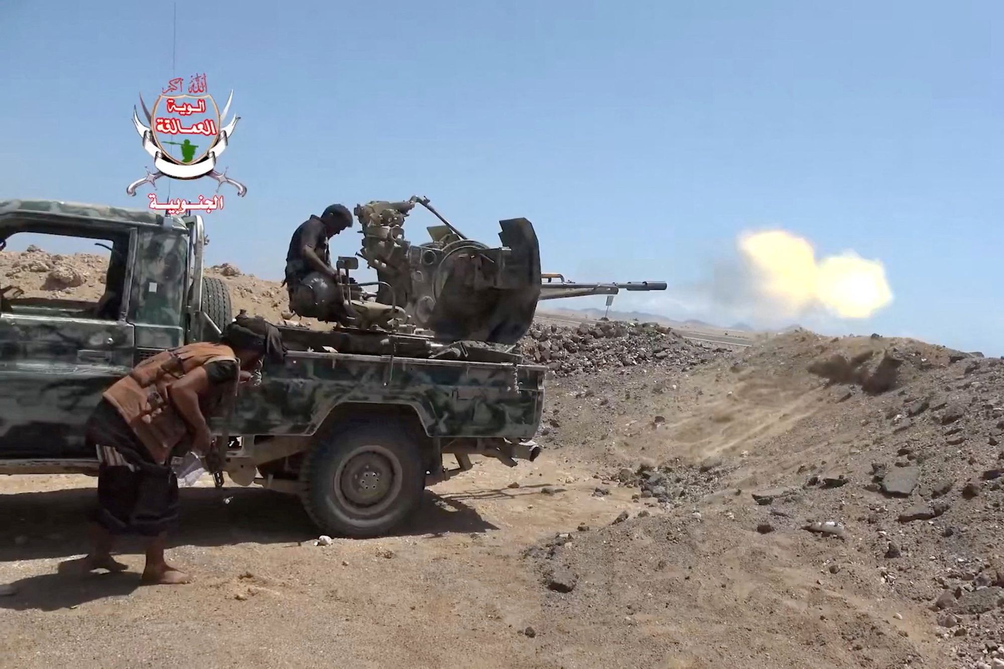 A pro-Saudi-backed Yemeni government fighter fires a vehicle-mounted weapon during what government forces say was an advance against the Iran-backed Houthis, near Dhubab, Taiz Governorate, Yemen, in this still image taken from video released October 5, 2026.    Southern Giants Brigades/Handout via REUTERS    THIS IMAGE HAS BEEN SUPPLIED BY A THIRD PARTY. MUST NOT OBSCURE LOGO. VERIFICATION: - Location partially verified from the runway, airport control tower, road layout, shape of the mountains and coastline, that matched topography mapping, satellite and archive imagery. - Date could not be independently verified. - No older versions found posted online before October 5.