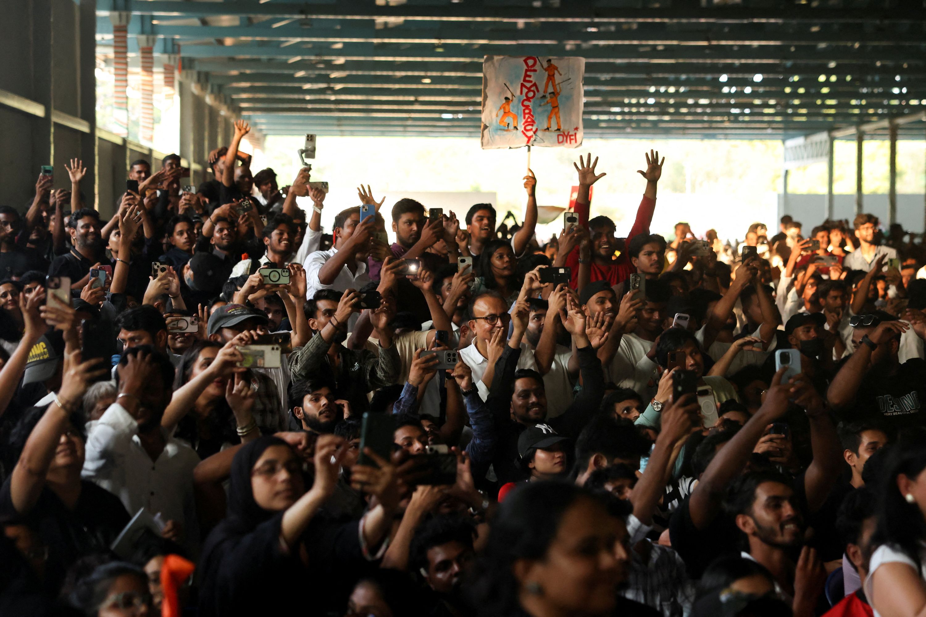Supporters of the Cockroach Janta Party (CJP) attend a protest demanding women's safety in Bengaluru, India, October 8, 2026.