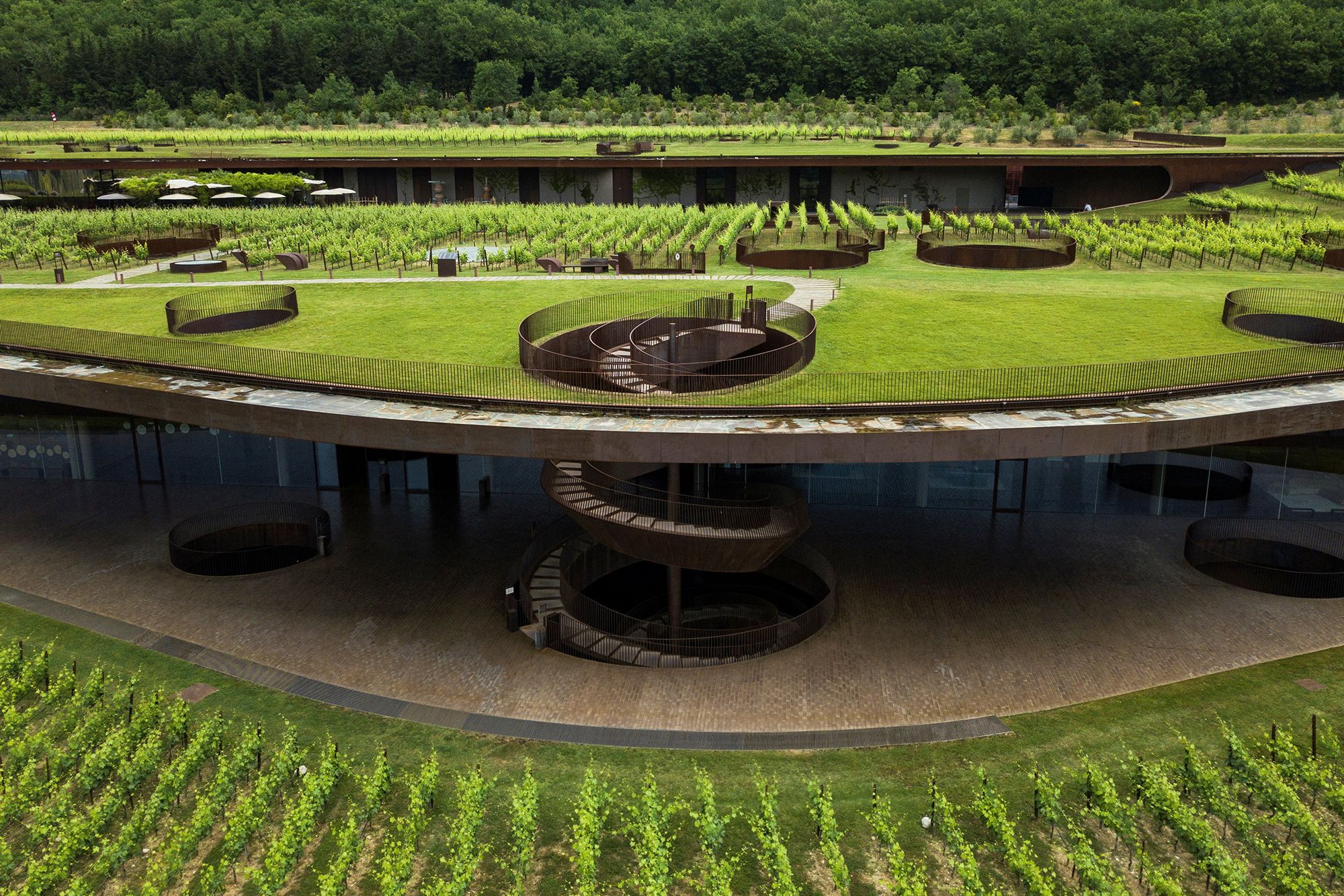 A drone view shows the Marchesi Antinori winery surrounded by vineyards in Bargino, near Florence, Italy, in this undated handout image. Marchesi Antinori Press/Handout via REUTERS ATTENTION EDITORS - THIS IMAGE HAS BEEN SUPPLIED BY A THIRD PARTY. MANDATORY CREDIT. NO RESALES. NO ARCHIVES.