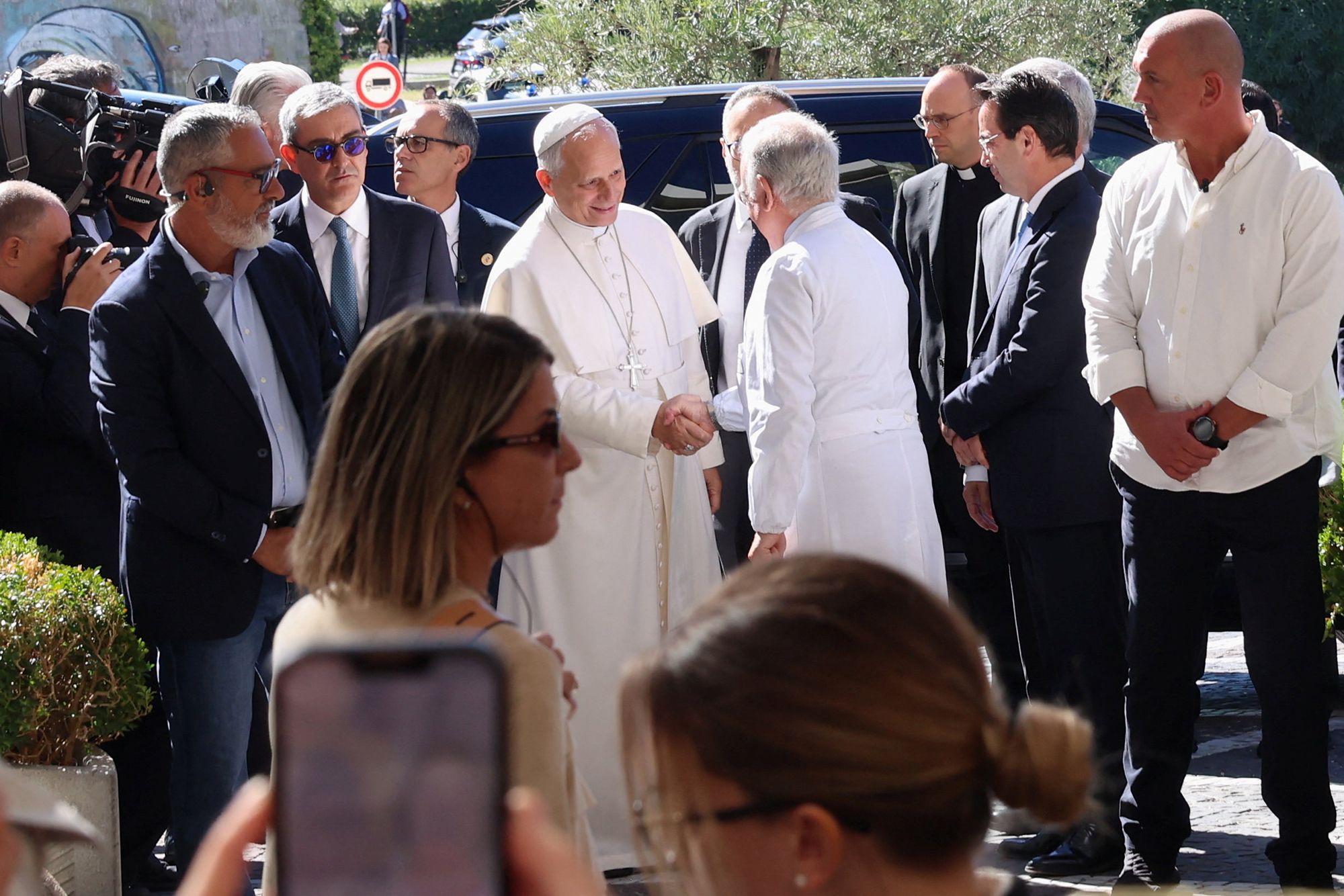 Pope Leo arrives at Gemelli Hospital ahead of the pontiff's surgery to remove a lung nodule, in Rome, Italy, October 13, 2026.
