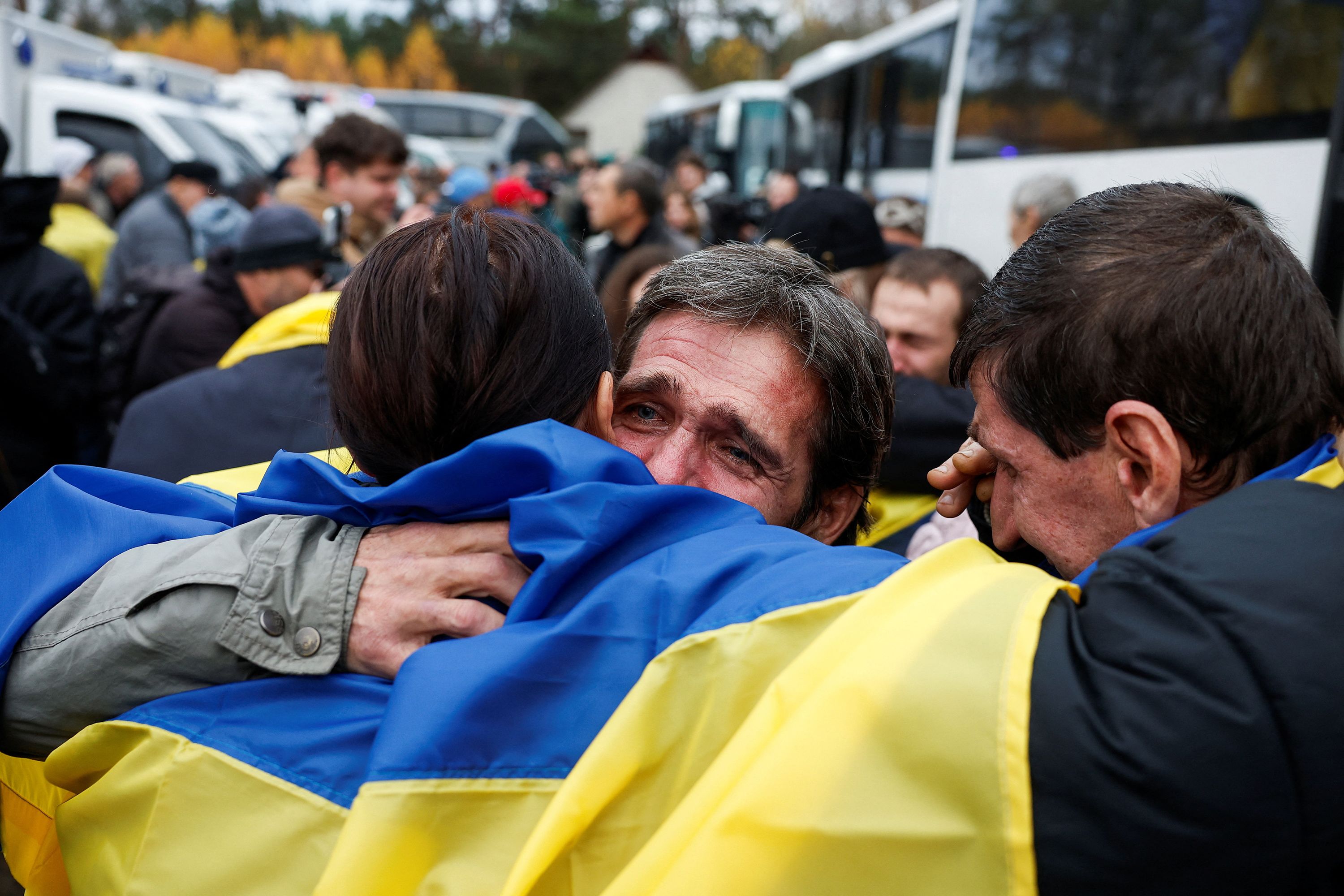 Residents evacuated from the Russian-occupied town of Oleshky are welcomed as they return to Ukrainian-controlled territory on October 31, 2026.