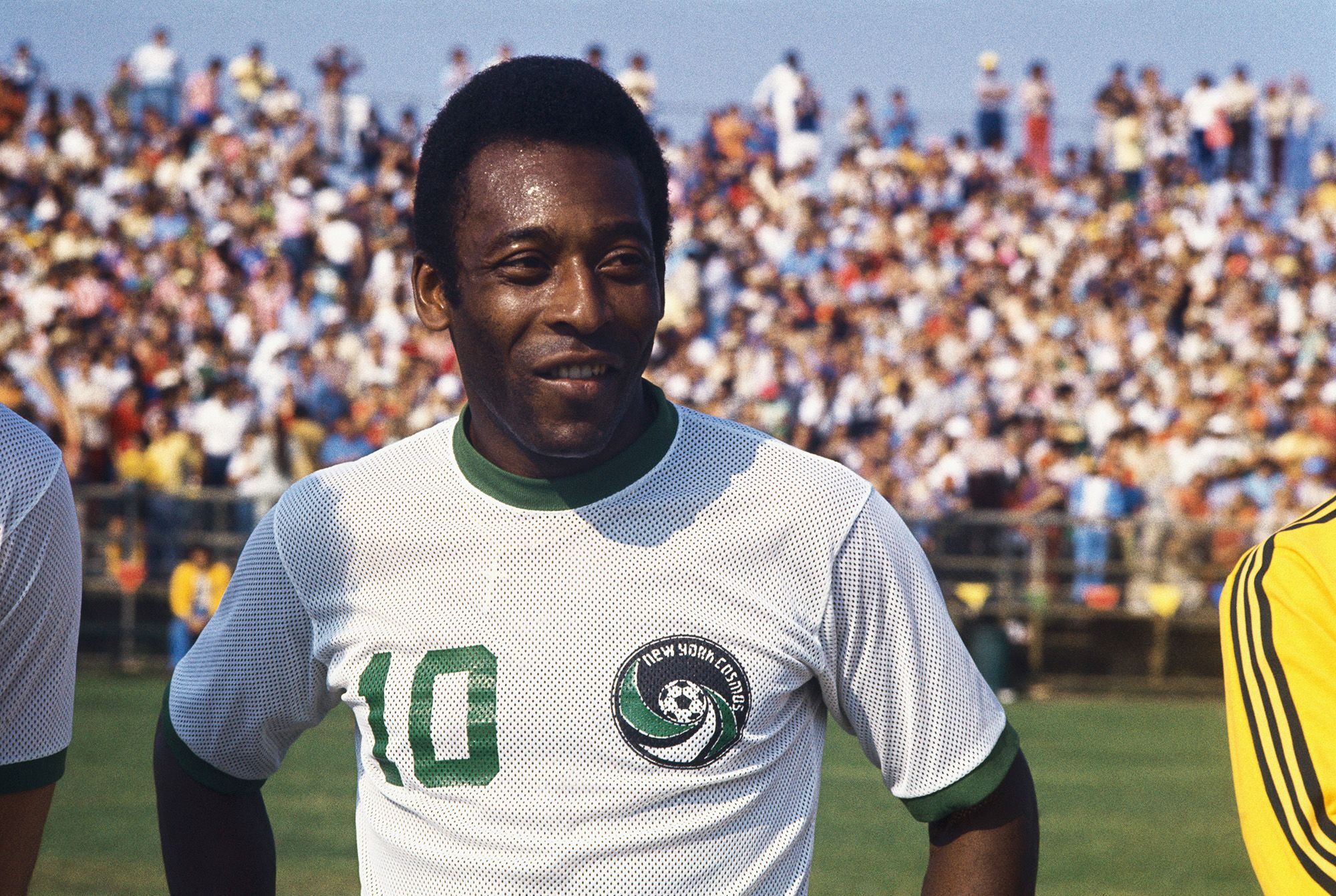 (Original Caption) Miami, Florida: Head and shoulders portrait of the New York Cosmos soccer sensation Pele standing on the field in New York Cosmos uniform. The crowd can be seen in the background.